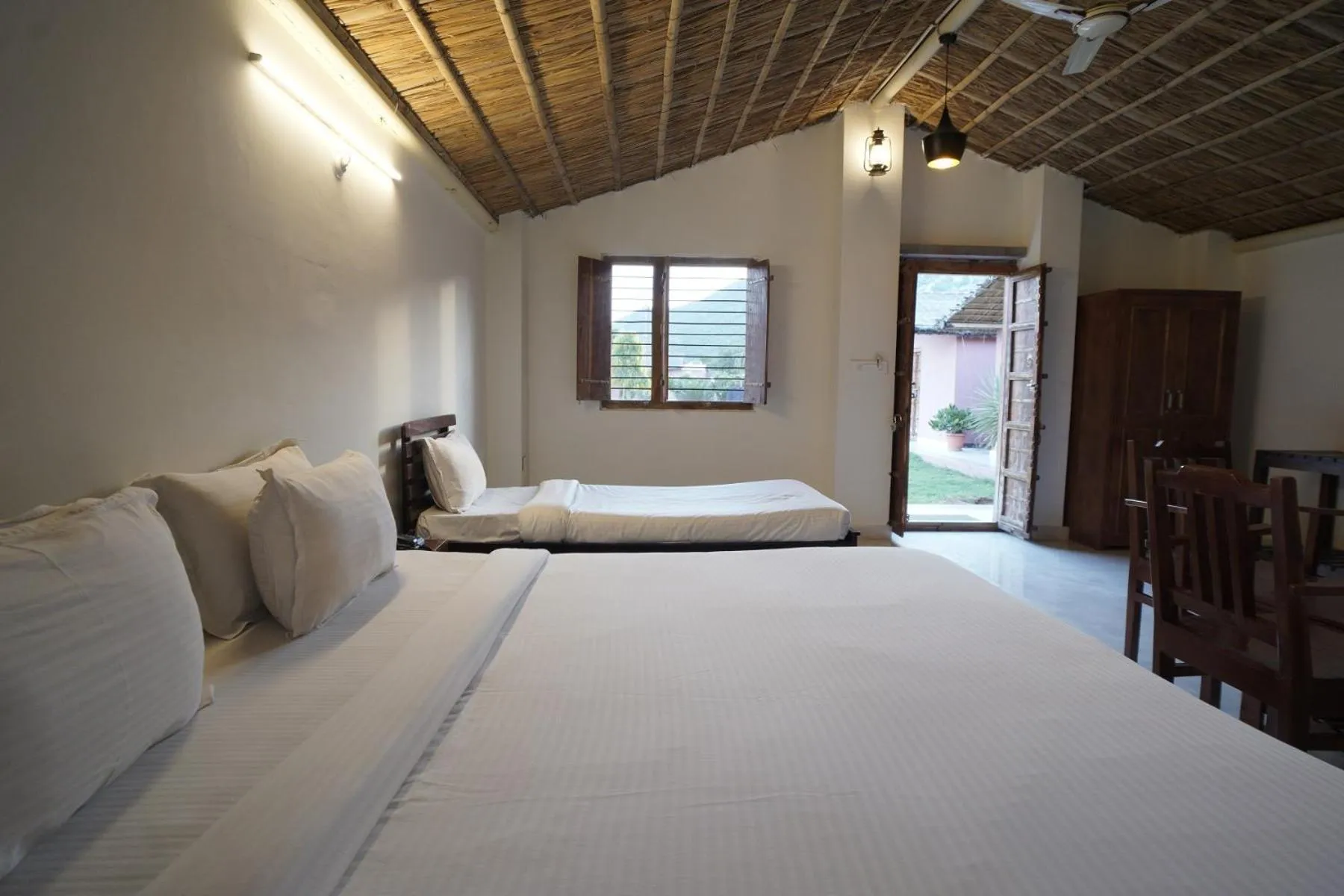 Bed in Amar Bagh Resort