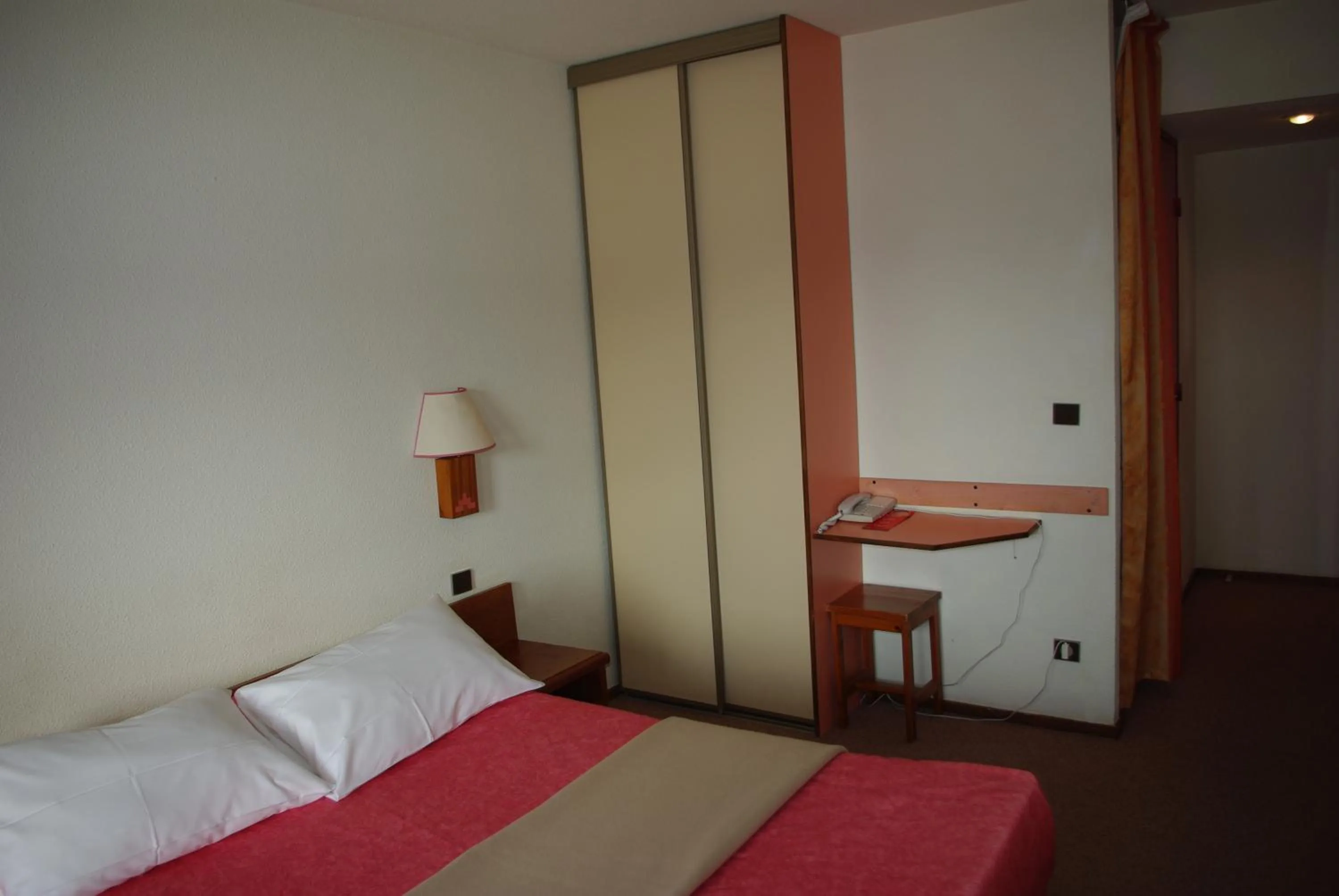 Photo of the whole room, Bed in Hôtel Club Le Risoux