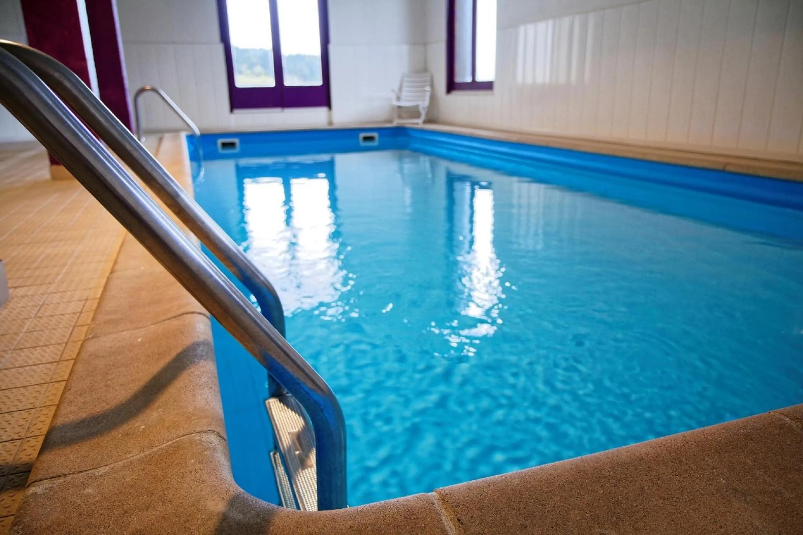 Swimming pool in Hôtel Club Le Risoux