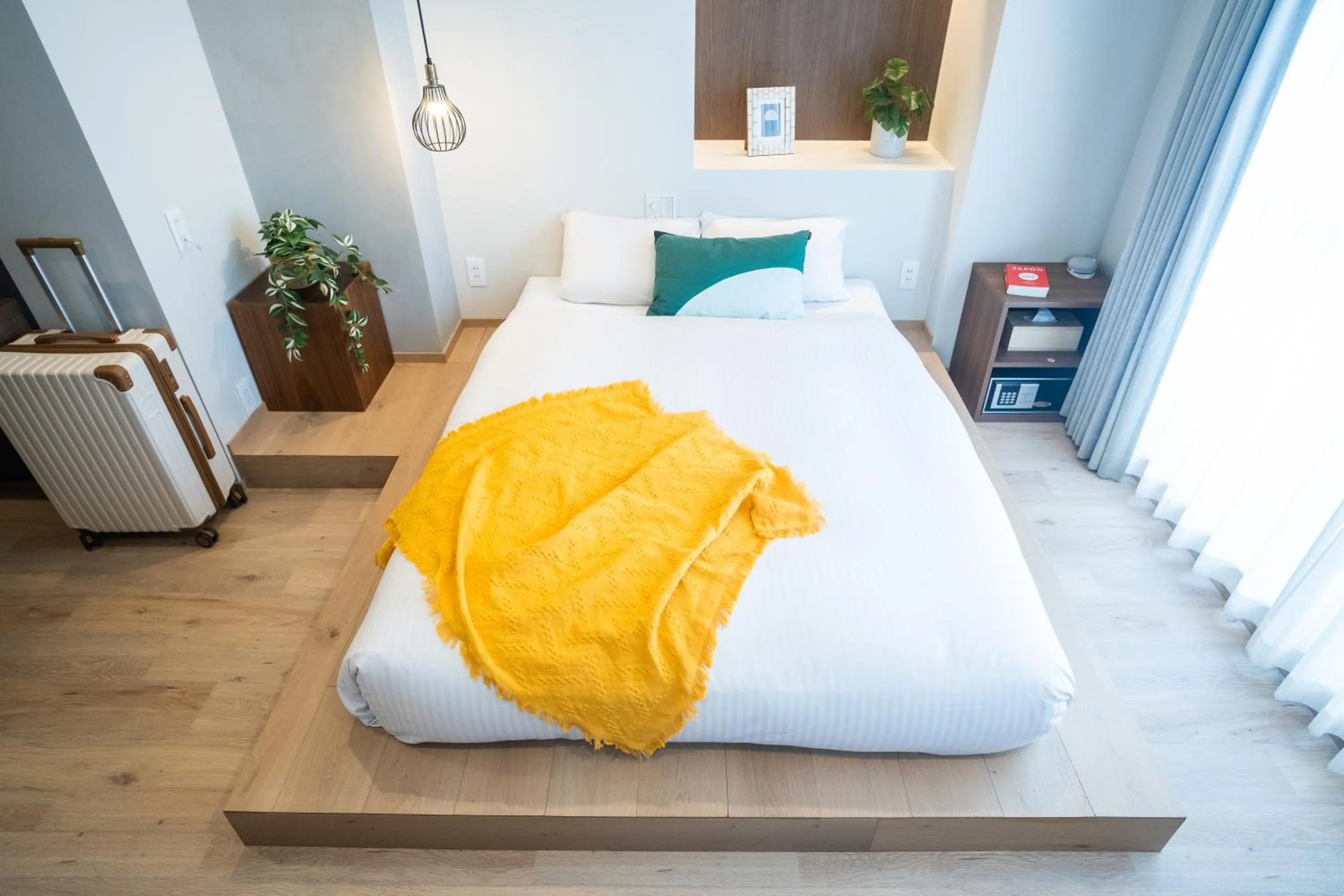 Bed in WAYFARER Kyoto Shijo