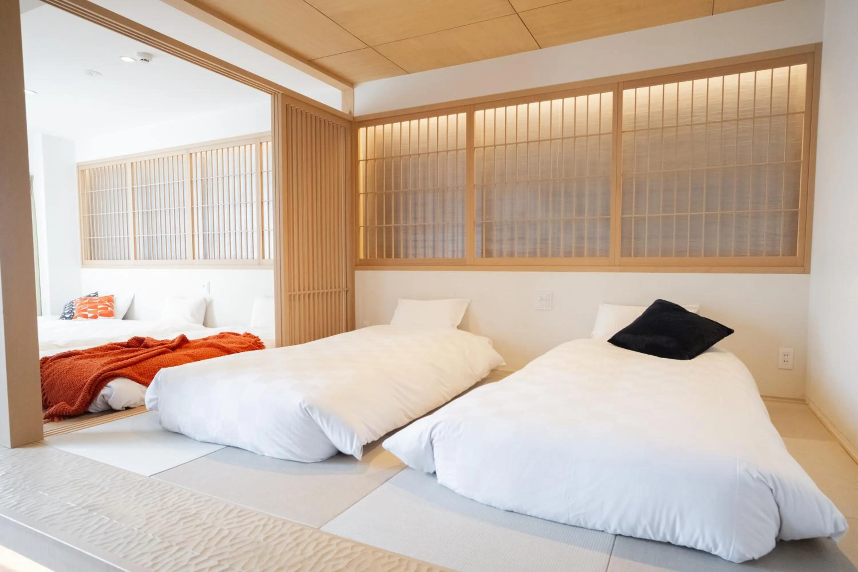 Bed in WAYFARER Kyoto Shijo