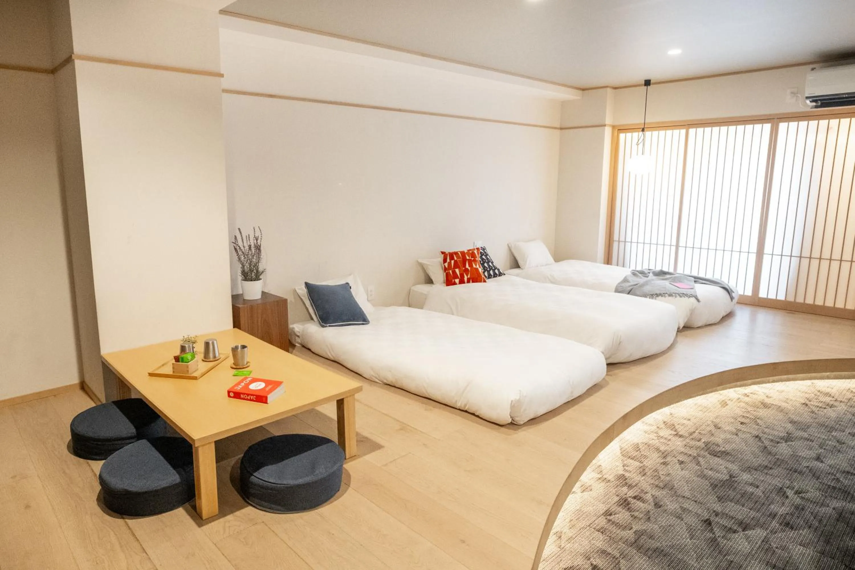 Bed in WAYFARER Kyoto Shijo