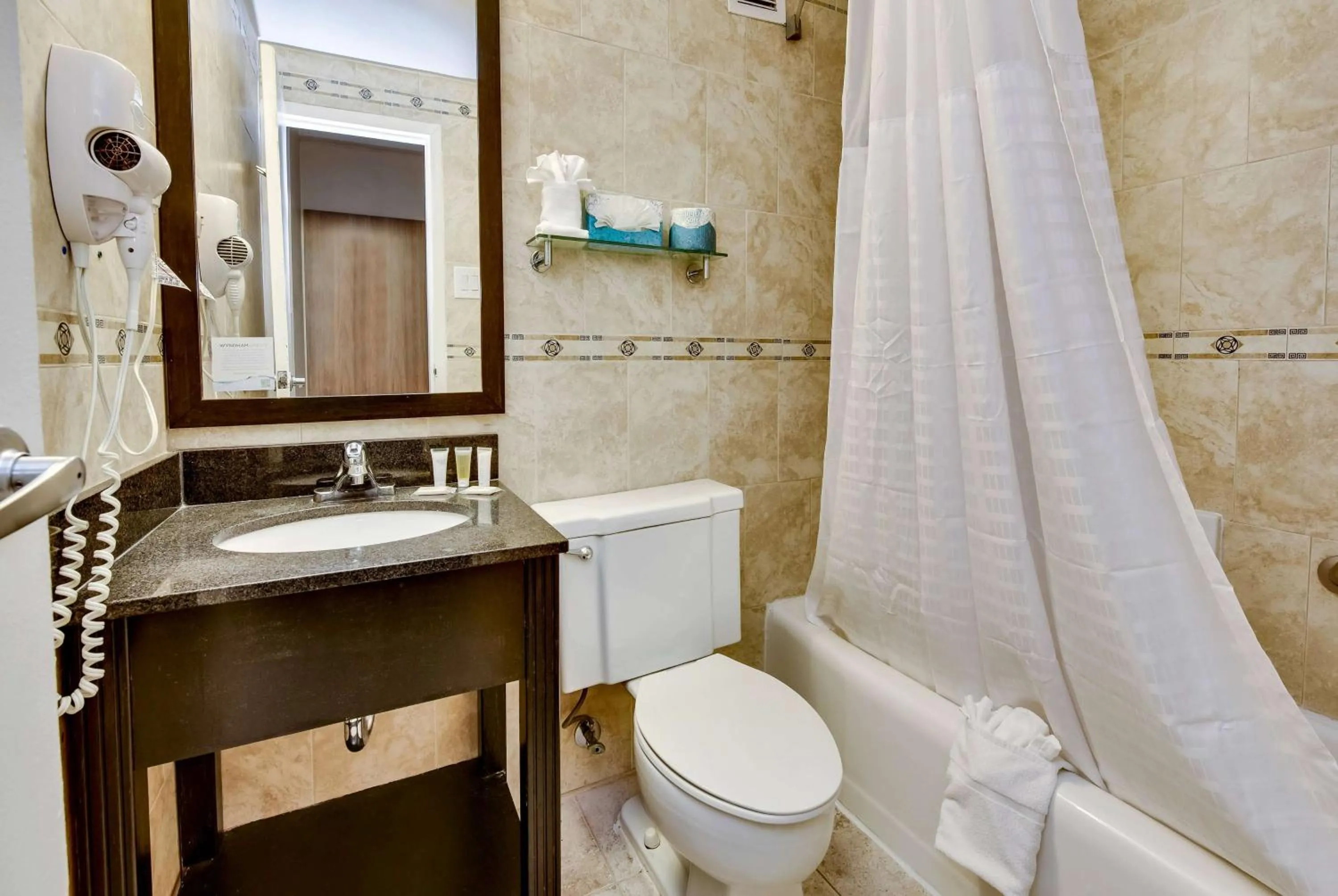 Bathroom in Days Inn by Wyndham Washington DC/Connecticut Avenue