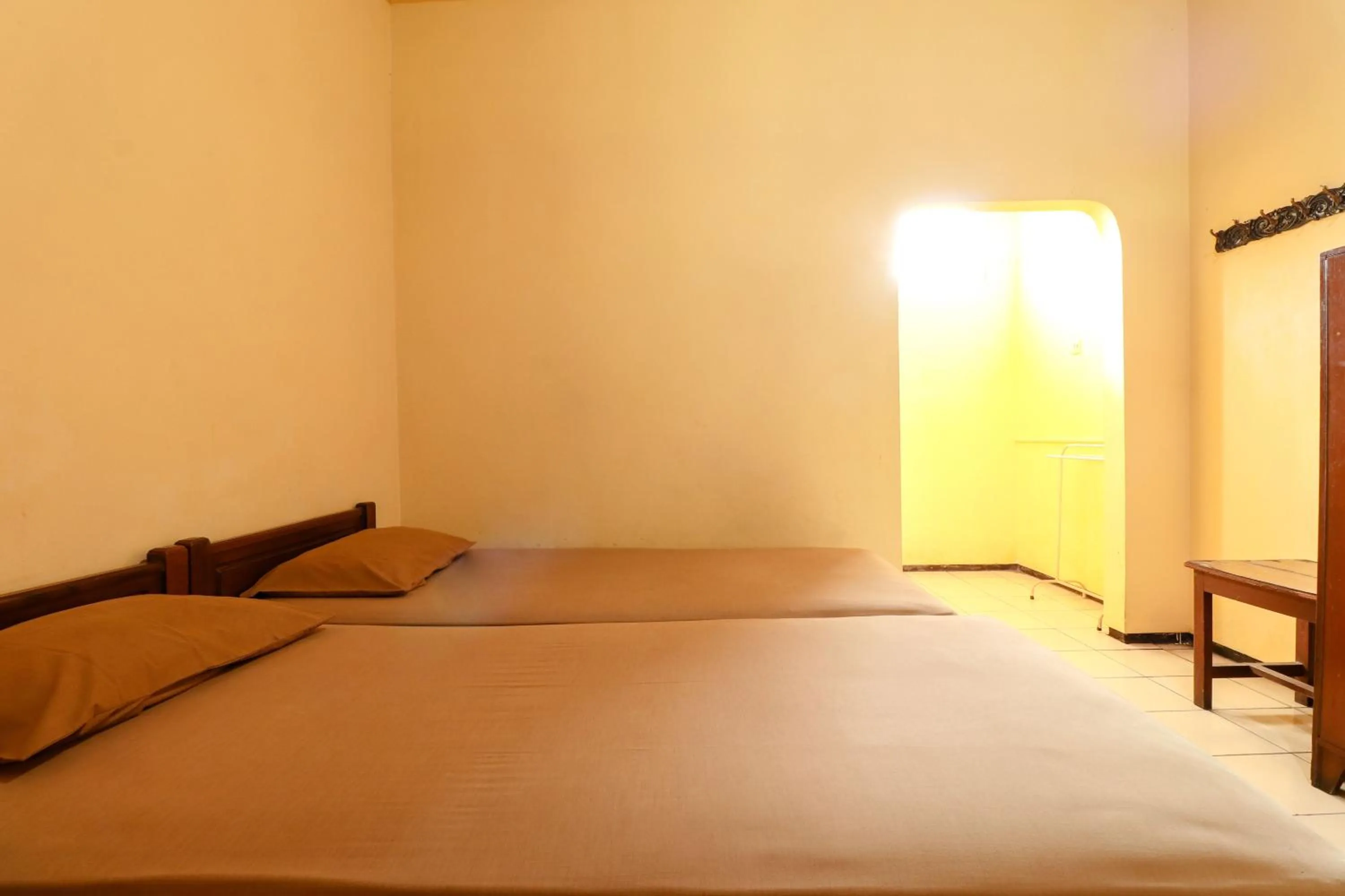 Bed in Hotel Bungurasih Syariah