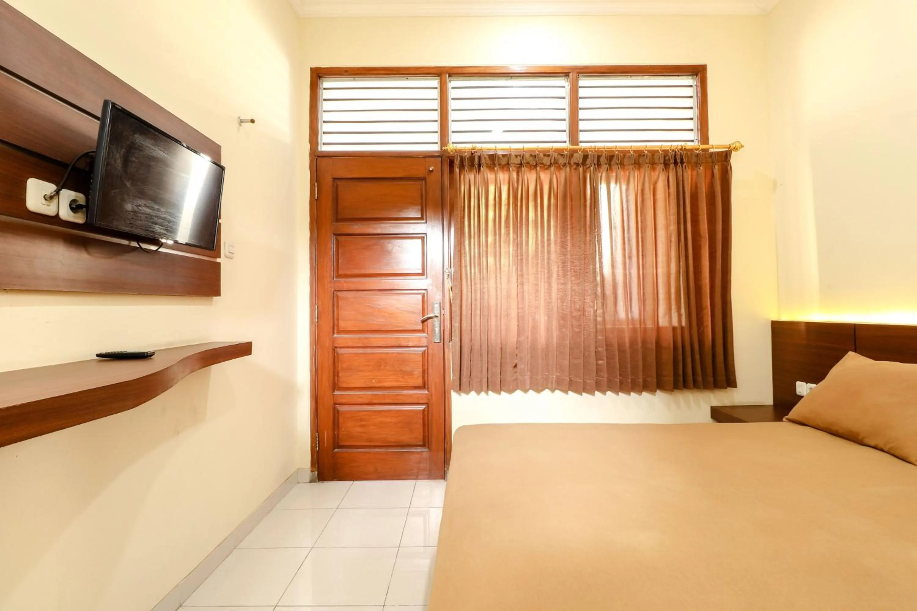 Bed in Hotel Bungurasih Syariah