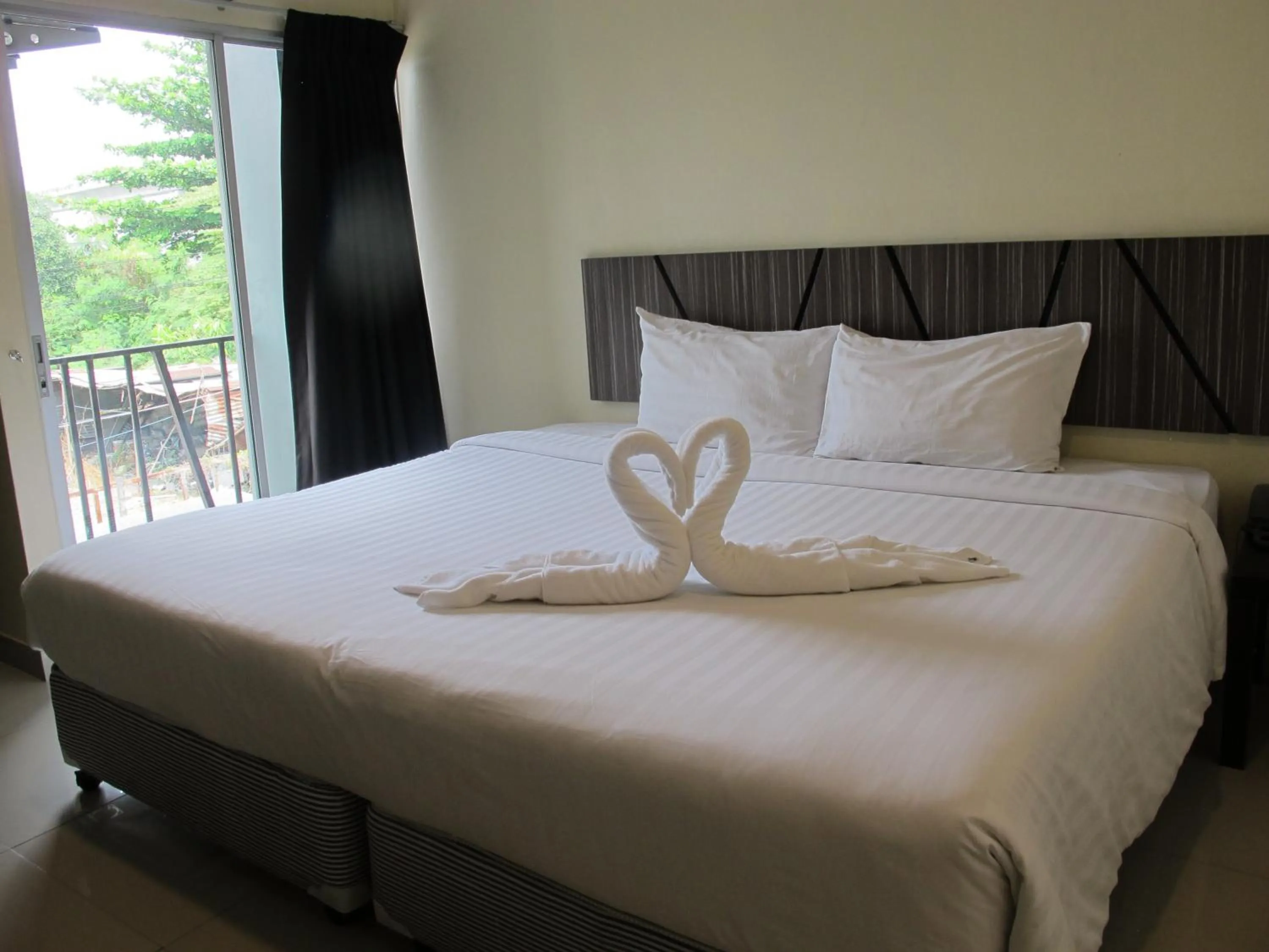 Bed in The Airy Residence