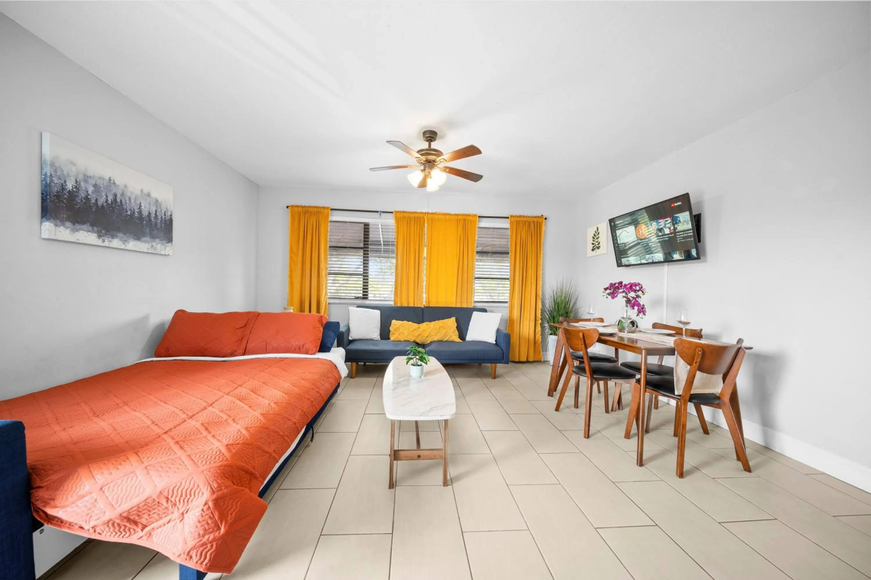 Living room, Bed in Bayview Apartments By Lowkl