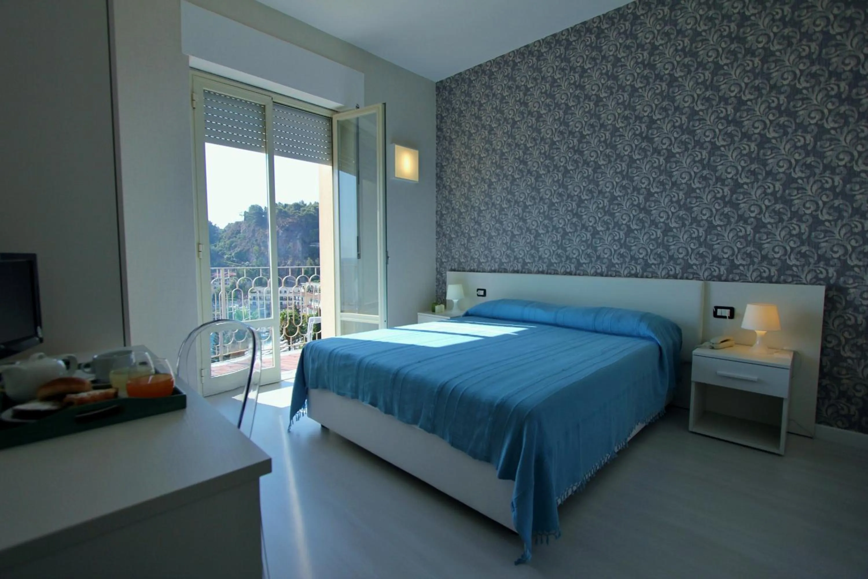 Photo of the whole room, Bed in Hotel Baia Azzurra