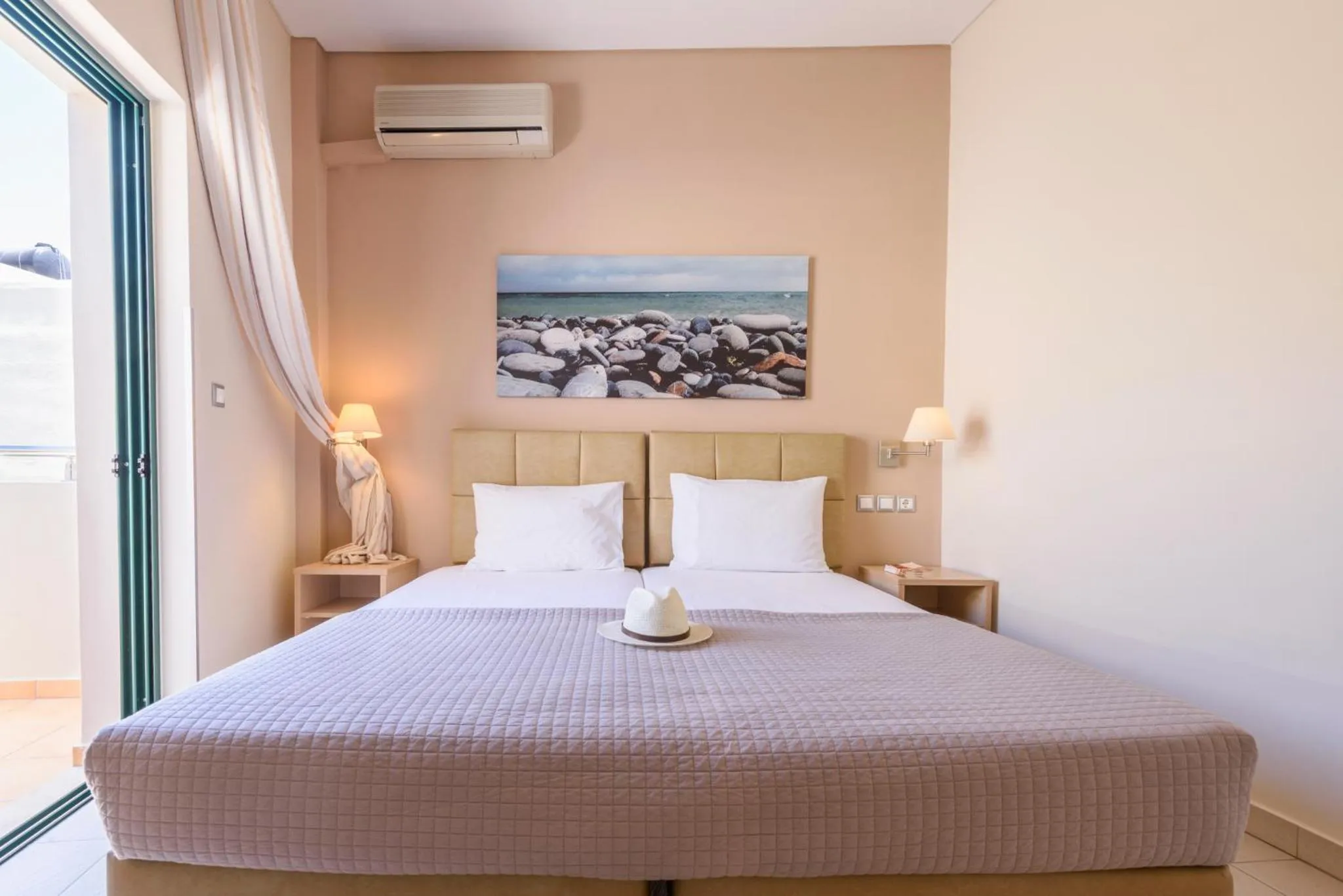 Bed in Hotel Poseidon