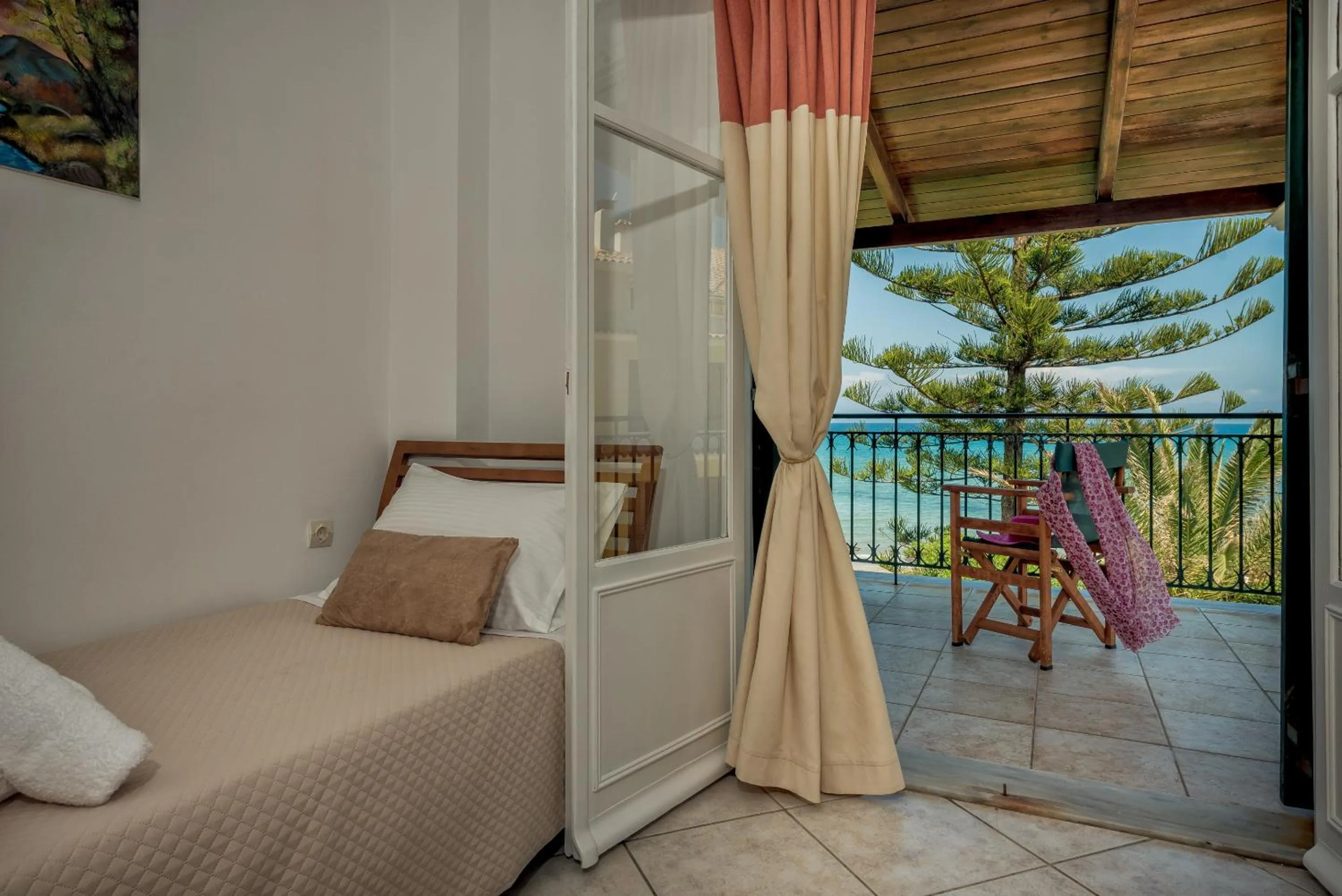 Bed in Zarkadis Beach Apartments