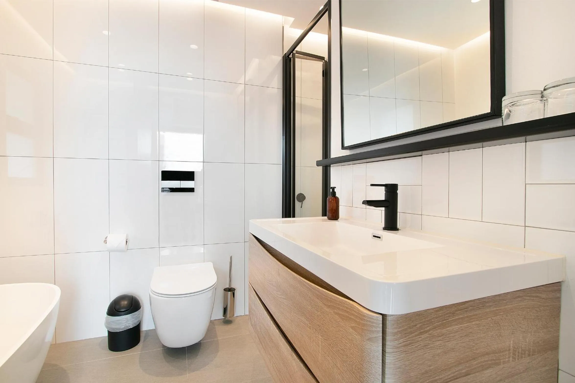 Bathroom in Latitude Aparthotel by Totalstay