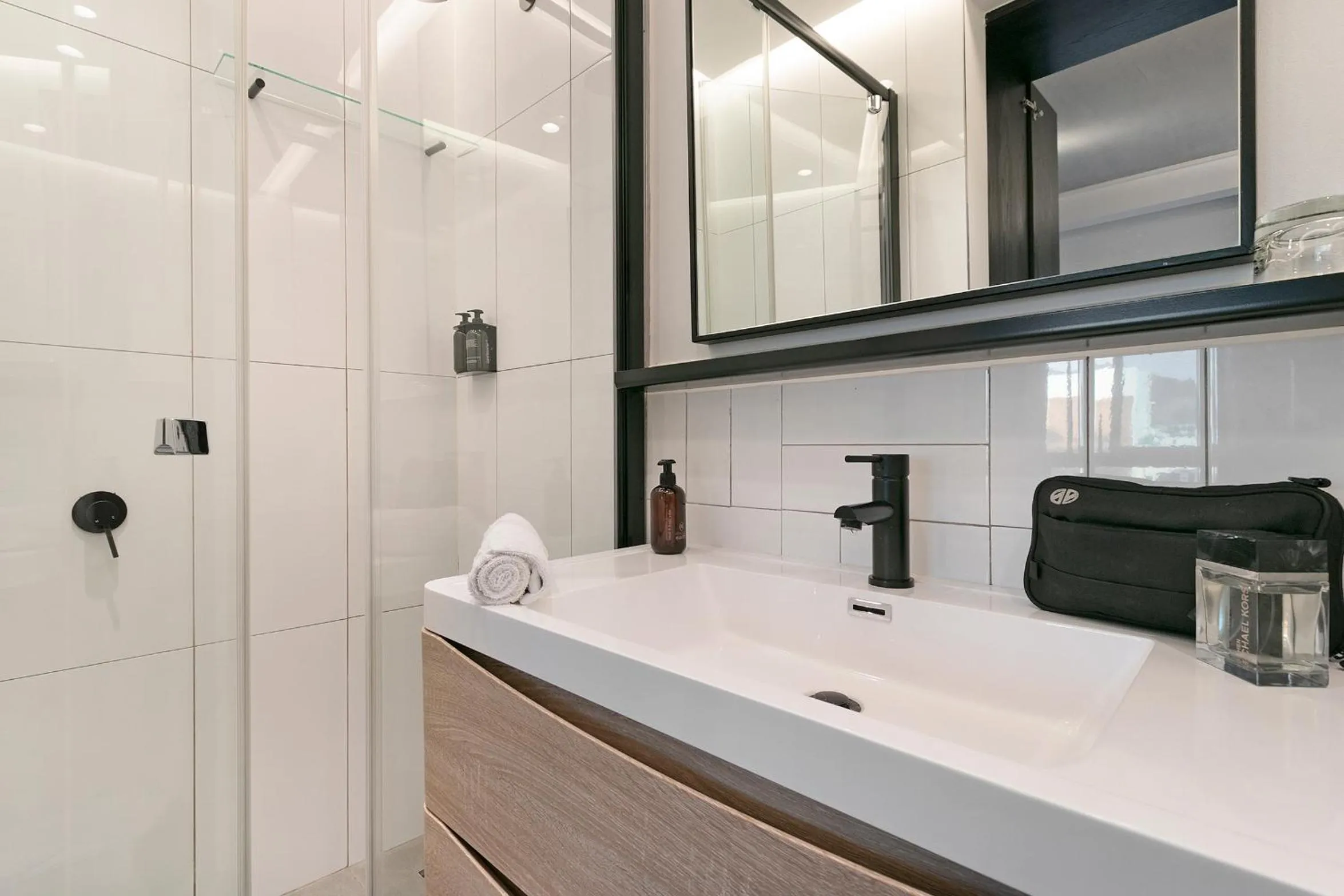 Bathroom in Latitude Aparthotel by Totalstay