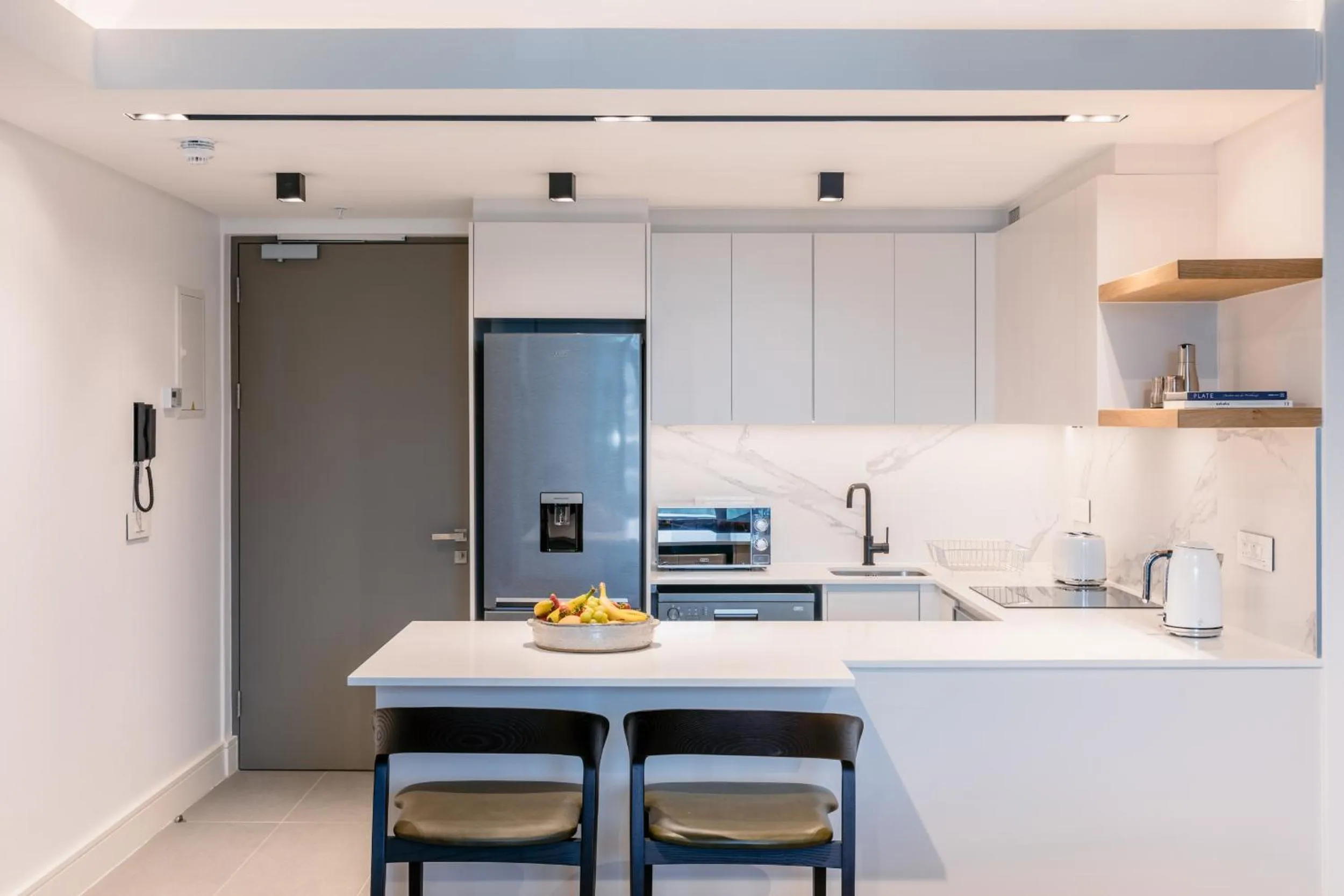 Kitchen or kitchenette in Latitude Aparthotel by Totalstay