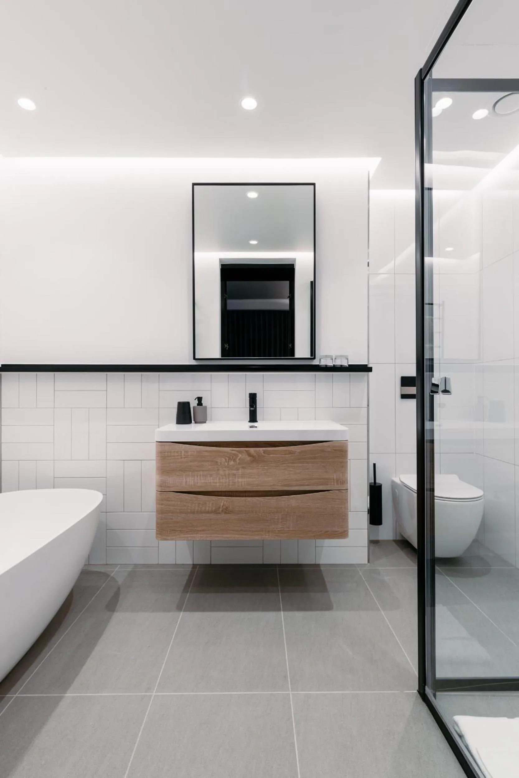 Bathroom in Latitude Aparthotel by Totalstay
