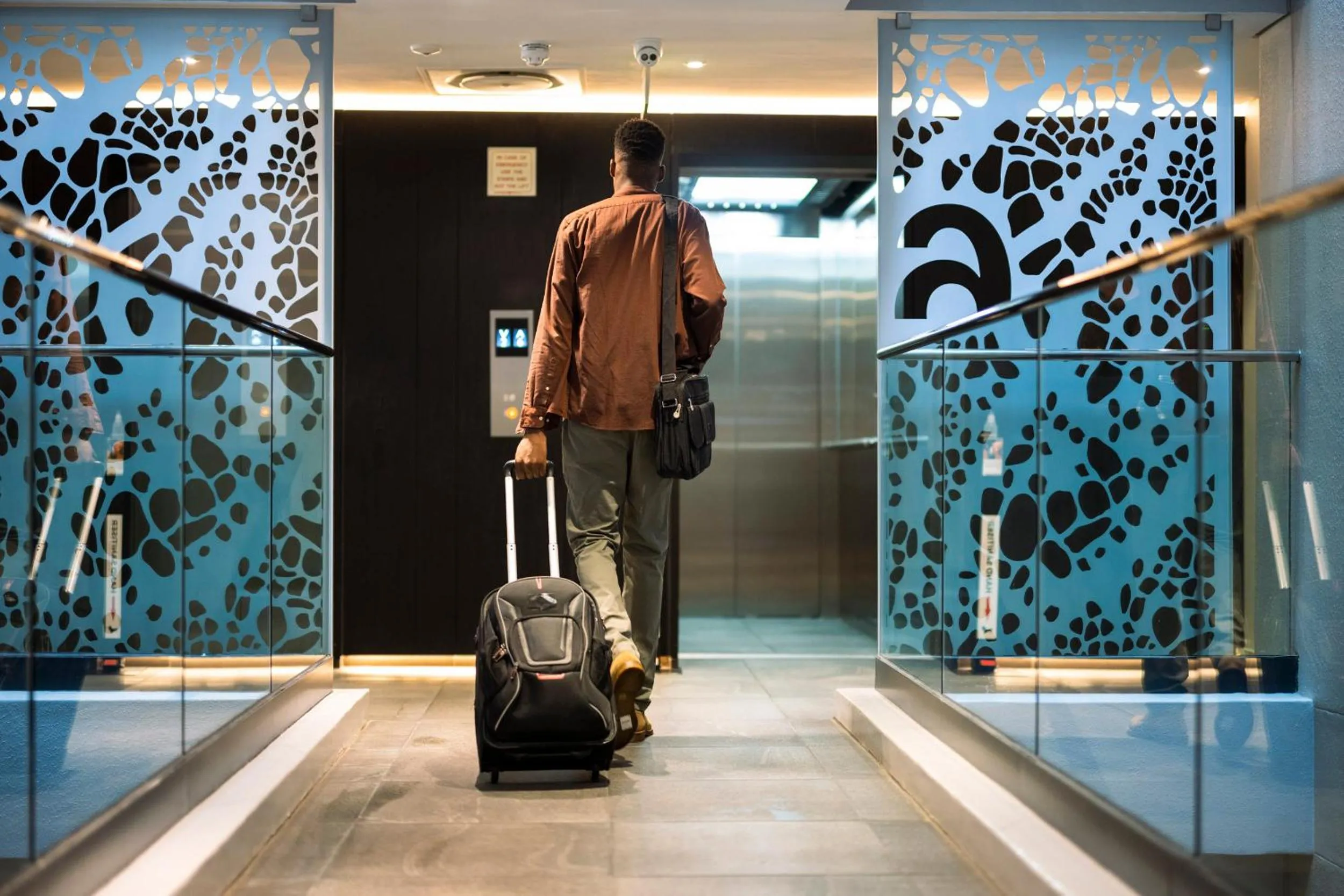 People in Latitude Aparthotel by Totalstay