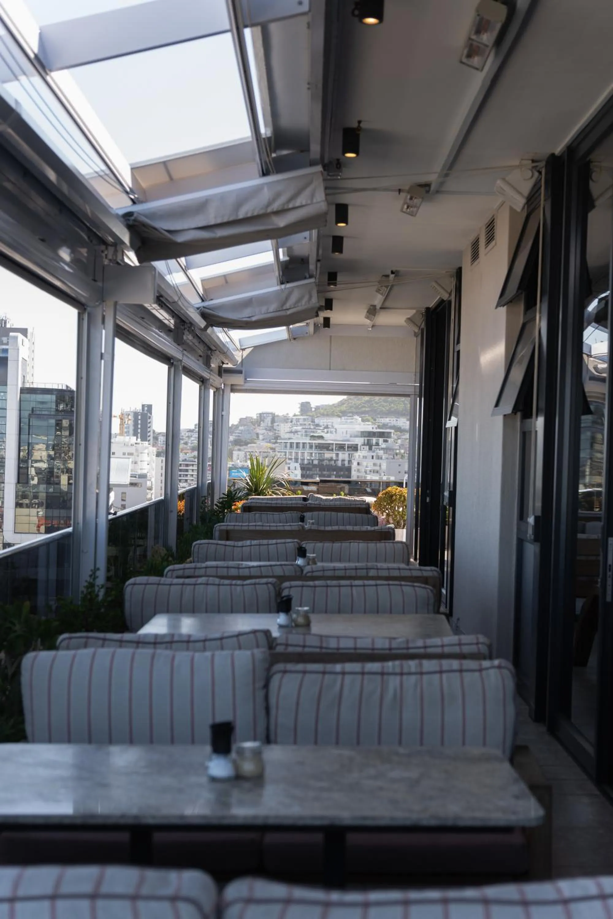 Seating area in Latitude Aparthotel by Totalstay