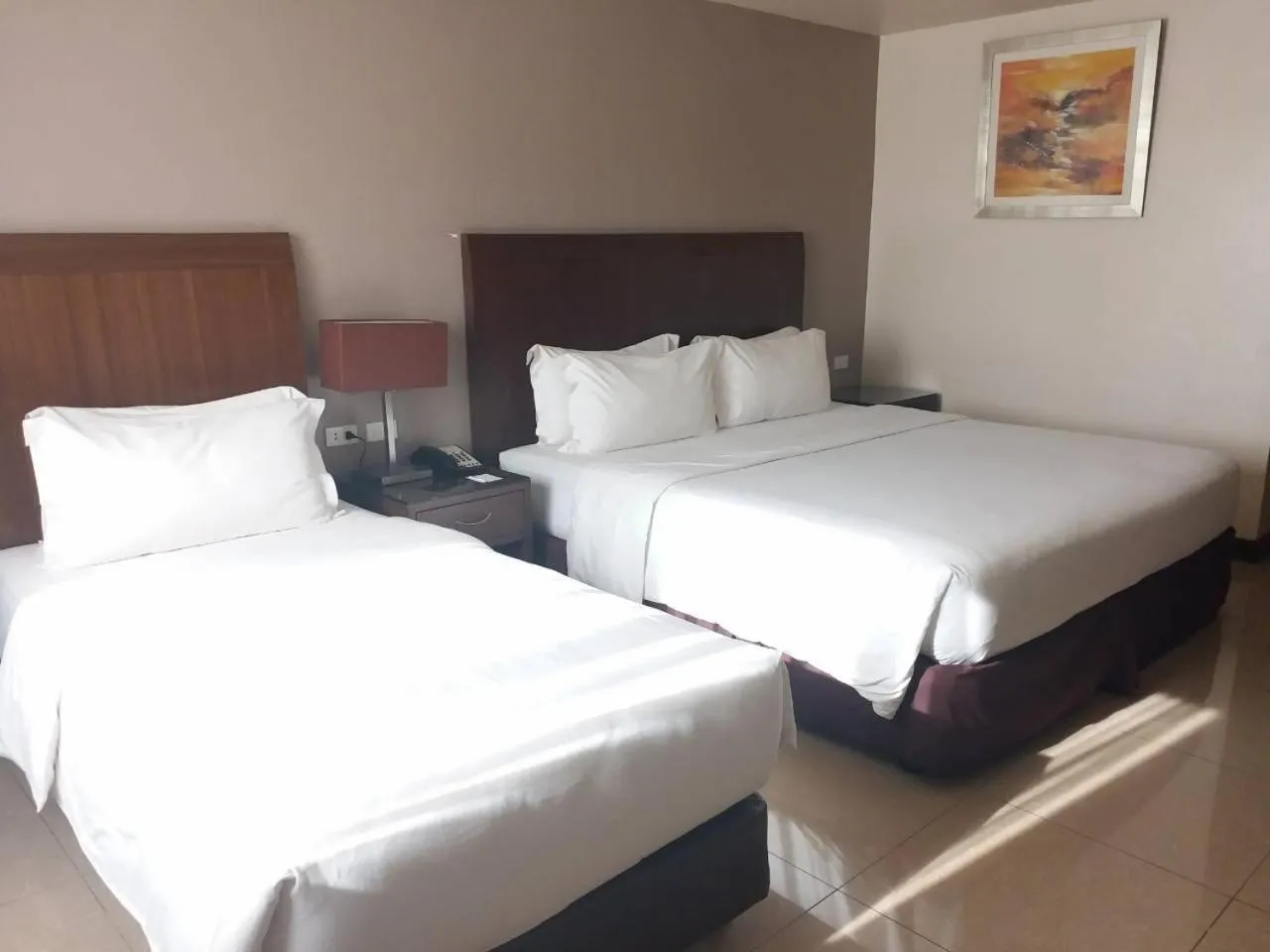 Bed in Mandarin Plaza Hotel