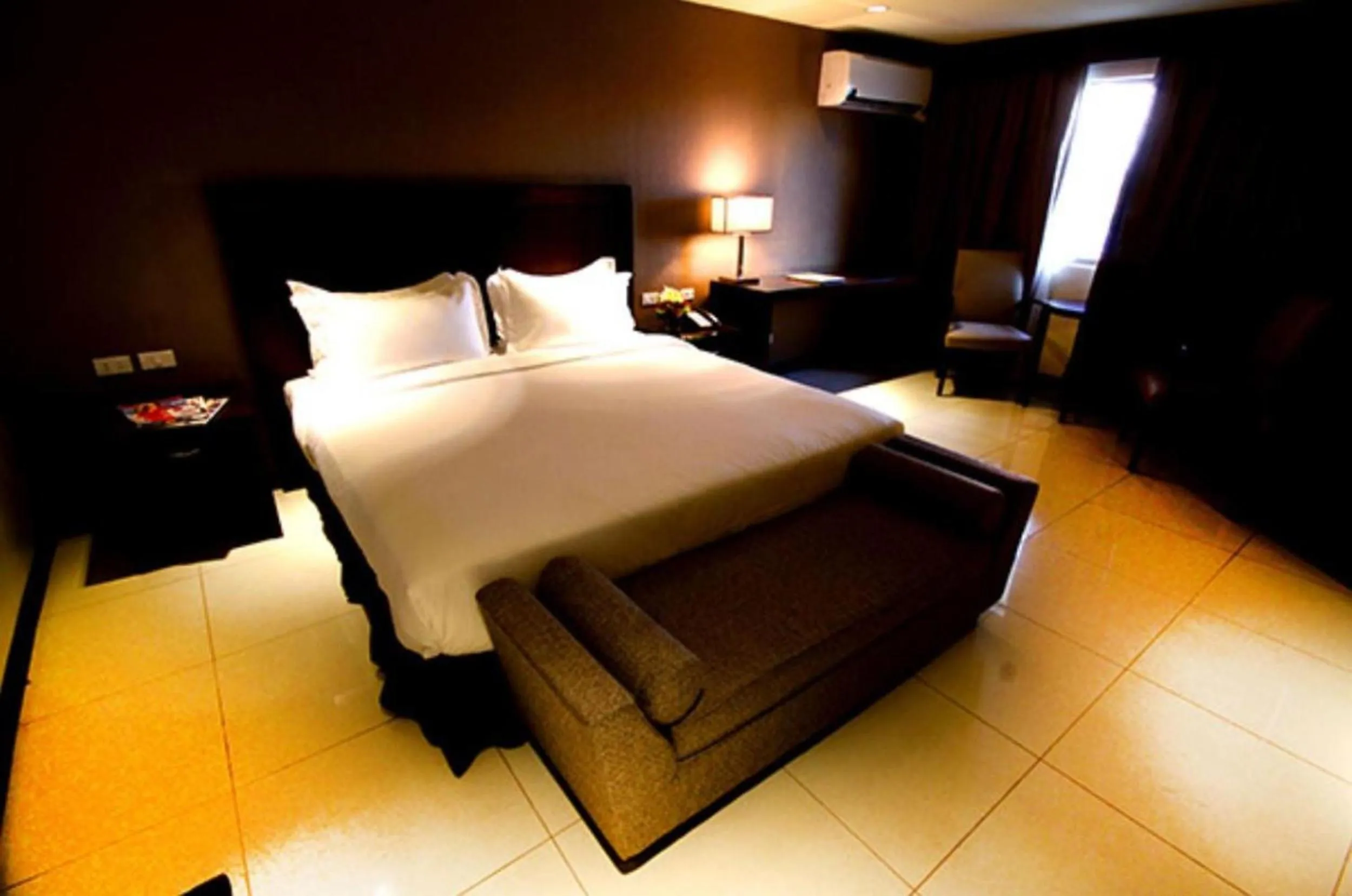 Bed in Mandarin Plaza Hotel