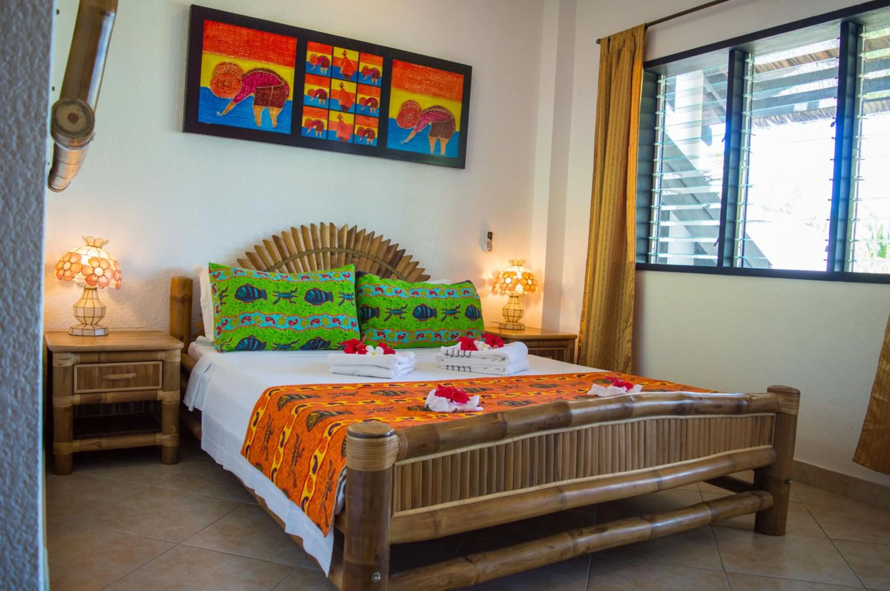 Bed in Dolphin House Resort Moalboal