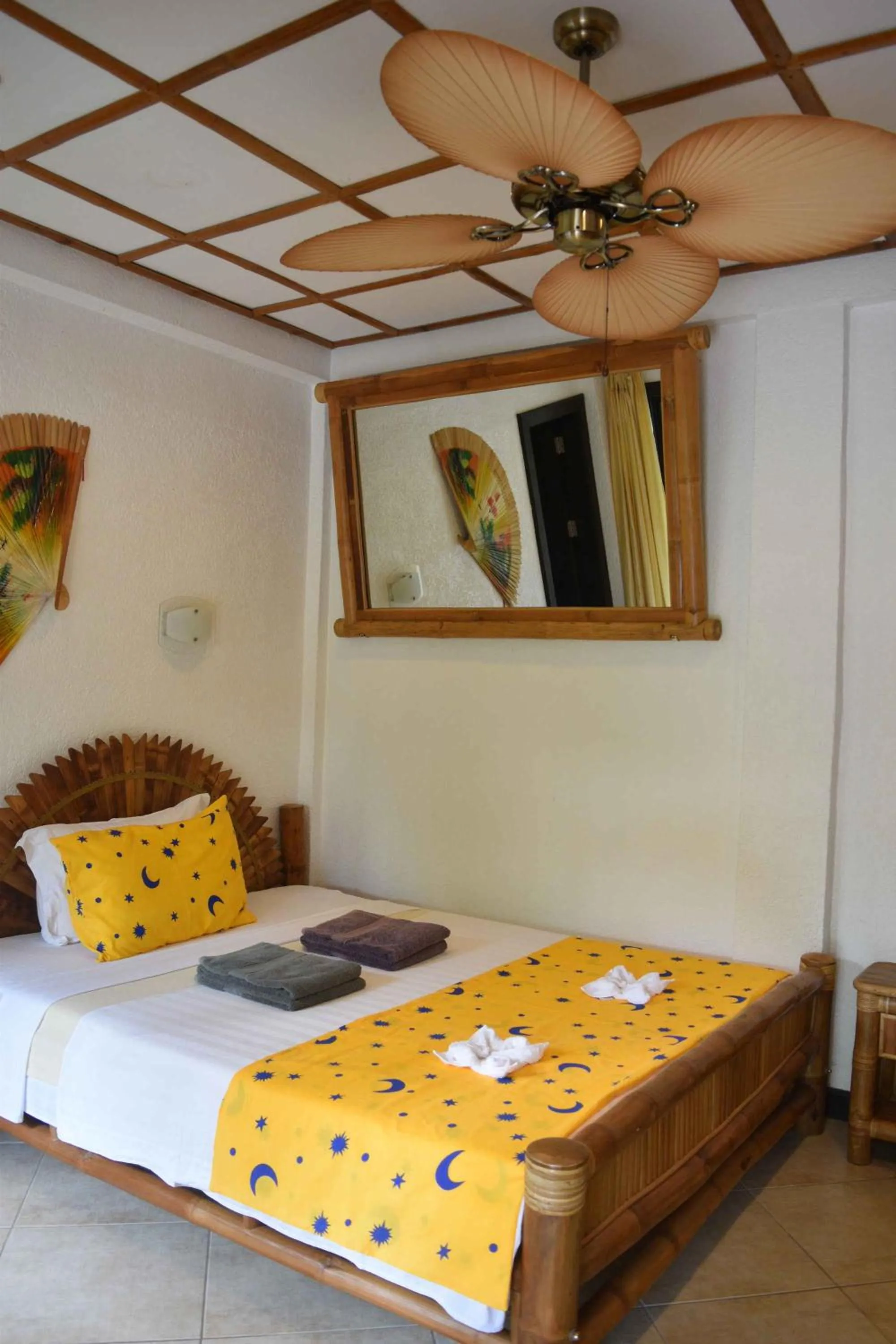 Bed in Dolphin House Resort Moalboal