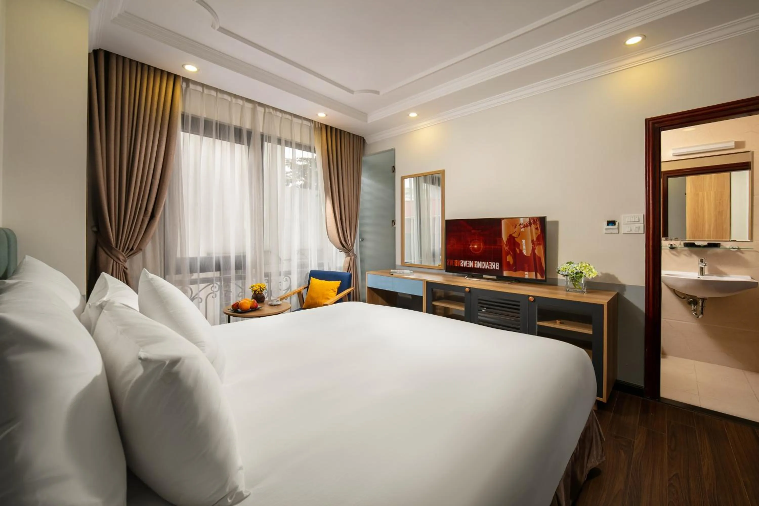 TV and multimedia, Bed in C'Bon Hotel Do Quang