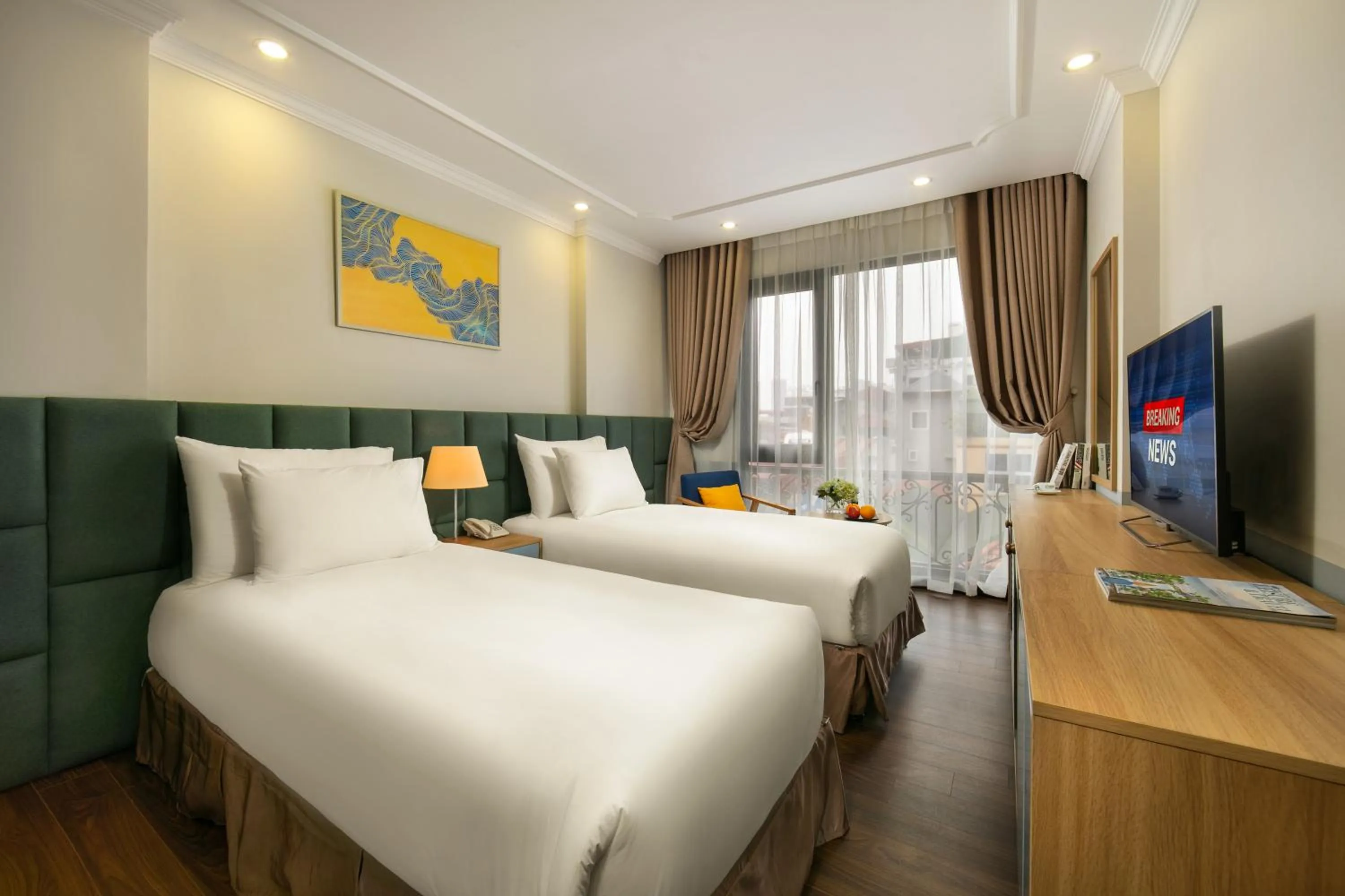 TV and multimedia, Bed in C'Bon Hotel Do Quang