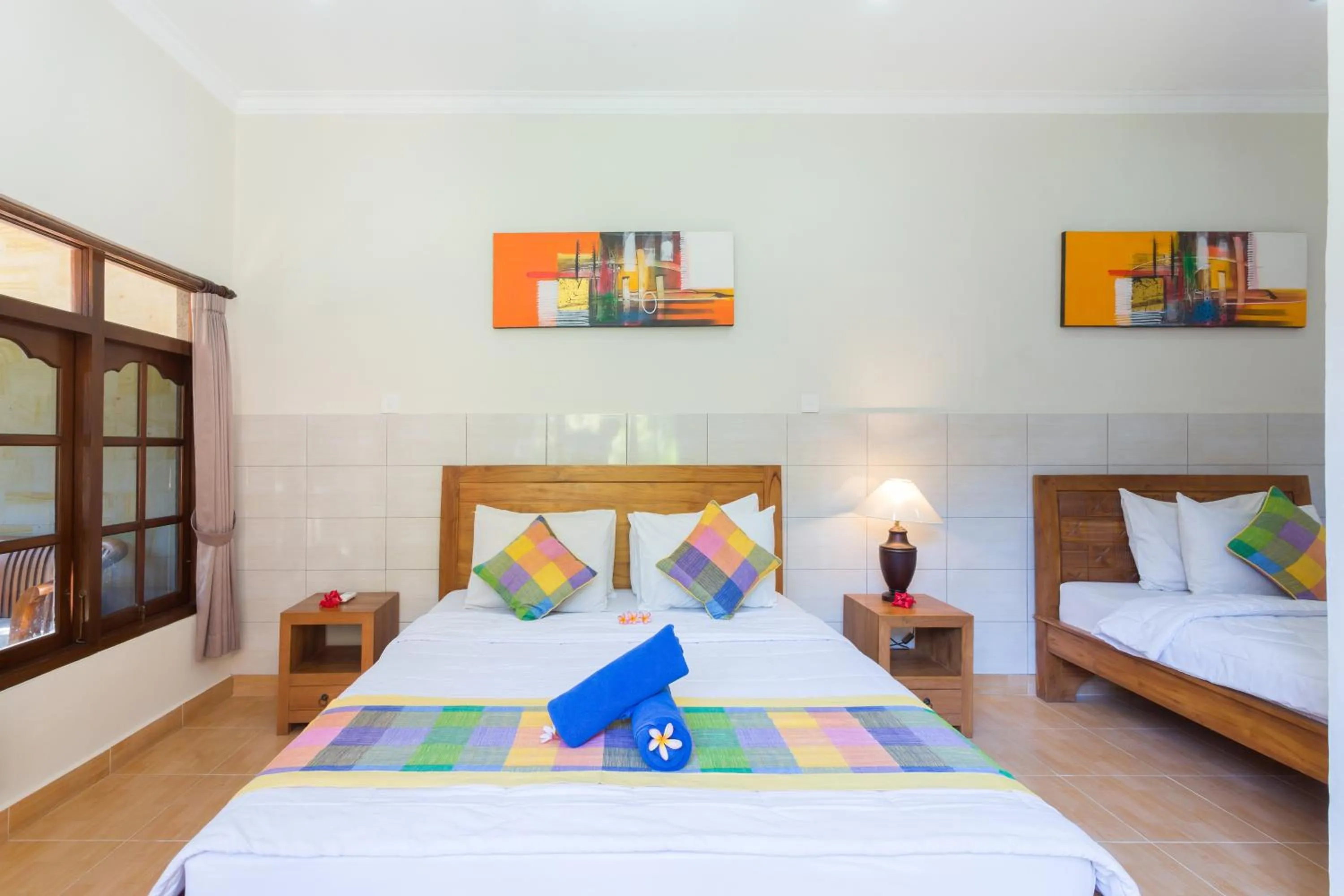 Bed in Wenara Bali Bungalows