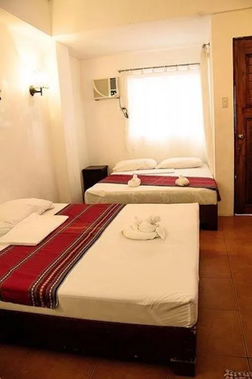 Bed in Boracay Ocean Bay Hotel