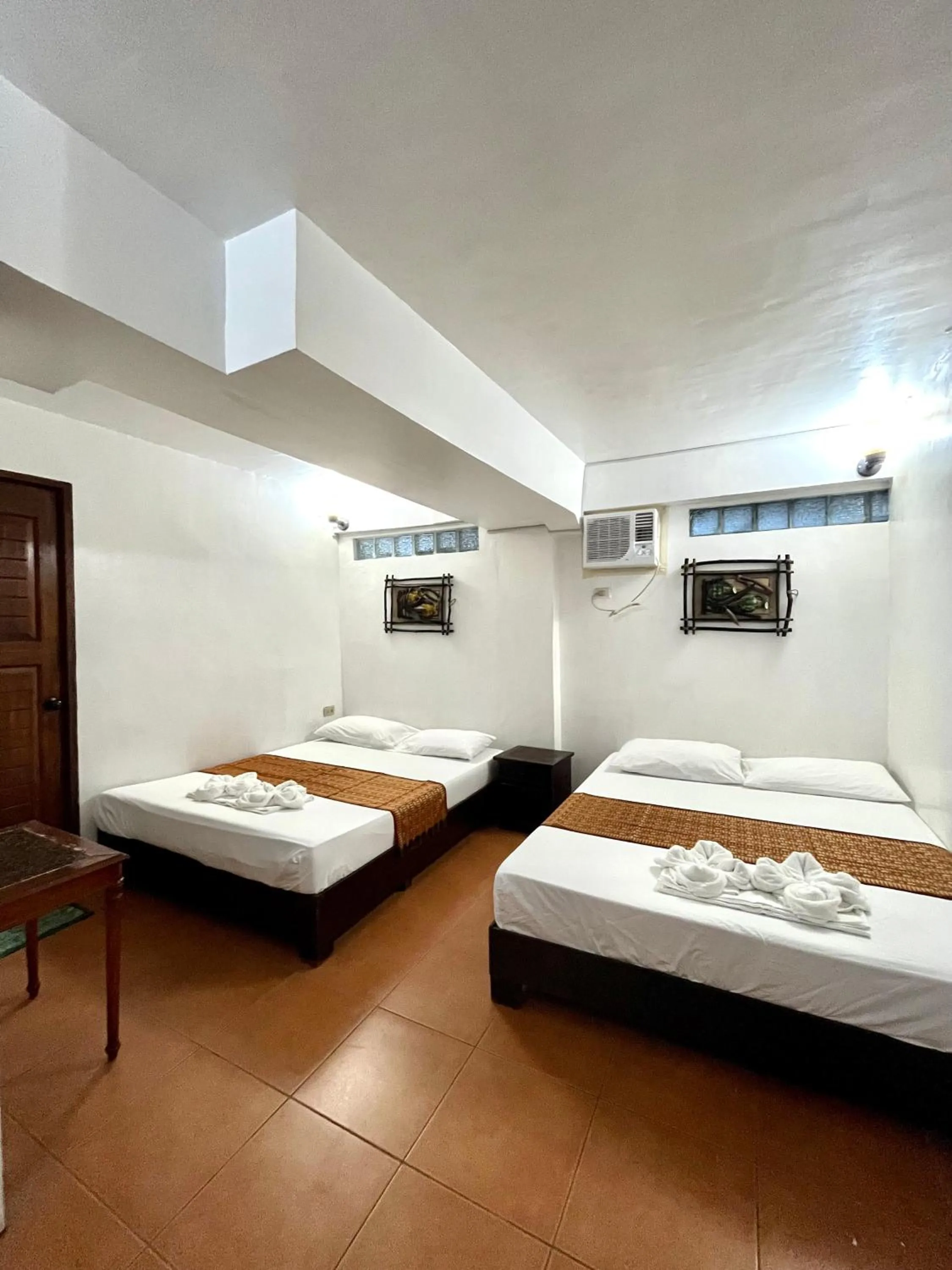 Bed in Boracay Ocean Bay Hotel