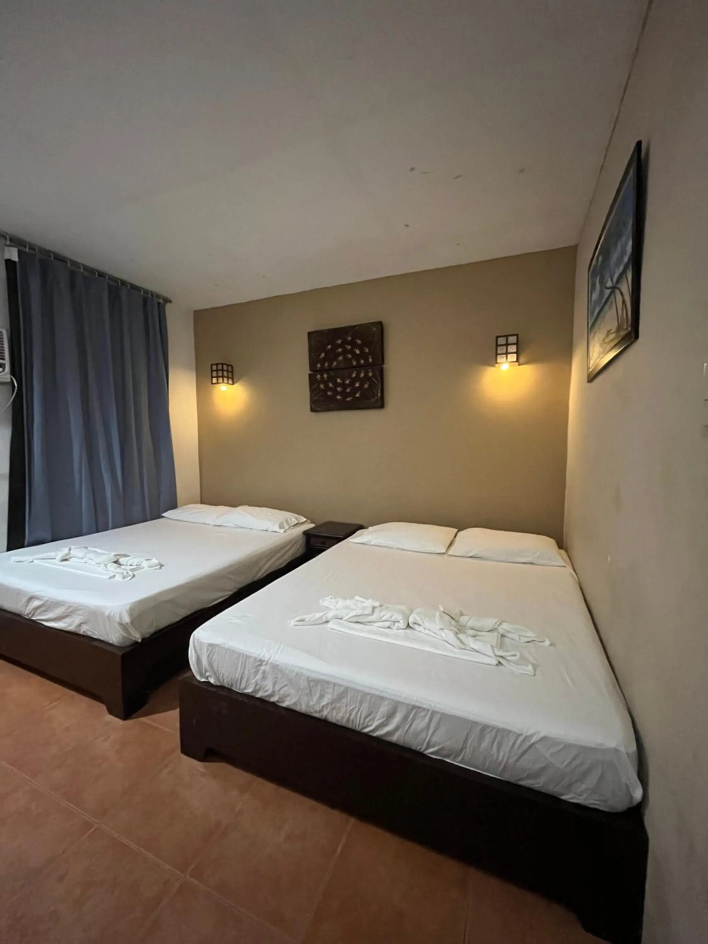 Bed in Boracay Ocean Bay Hotel