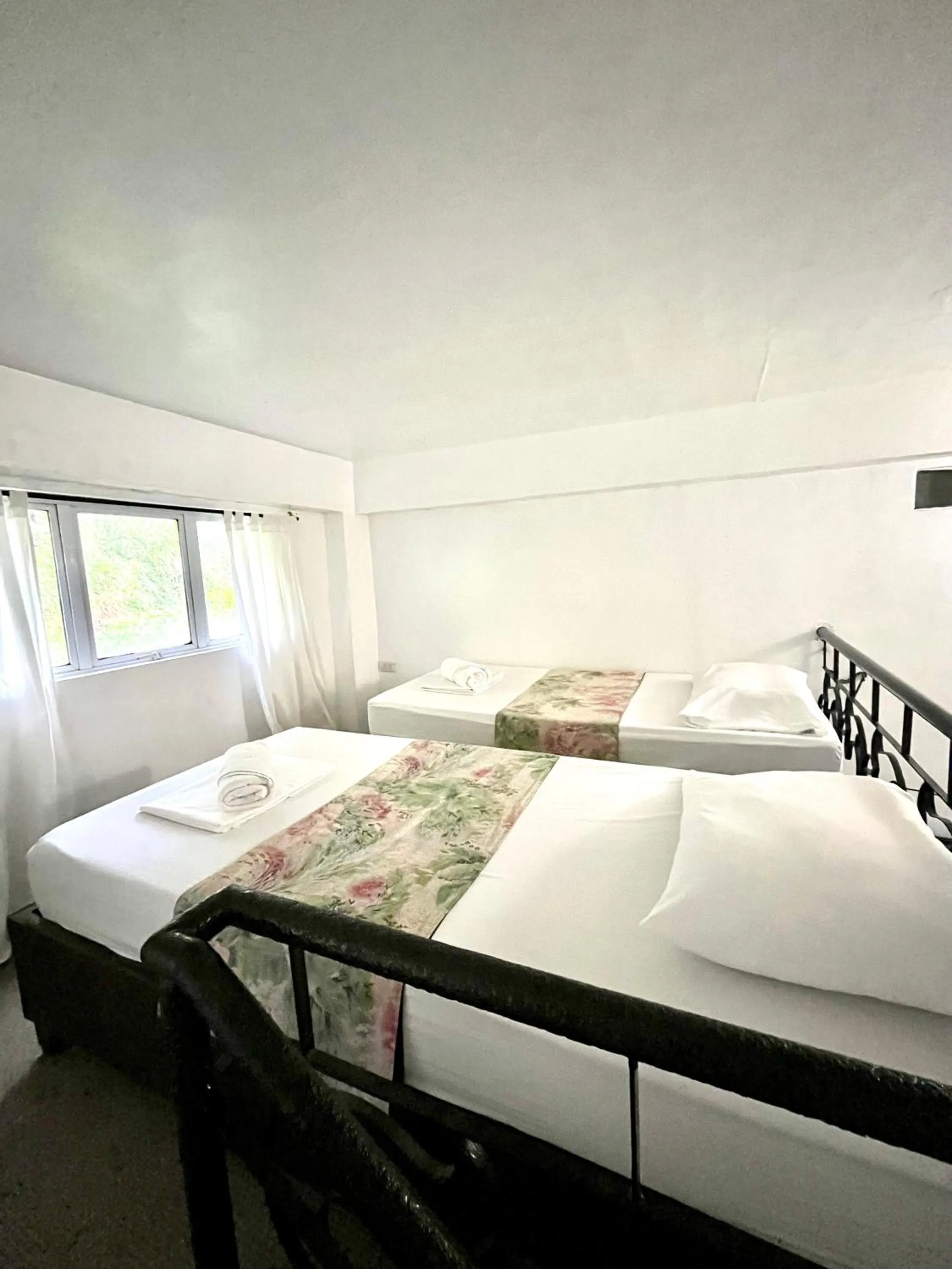 Bed in Boracay Ocean Bay Hotel