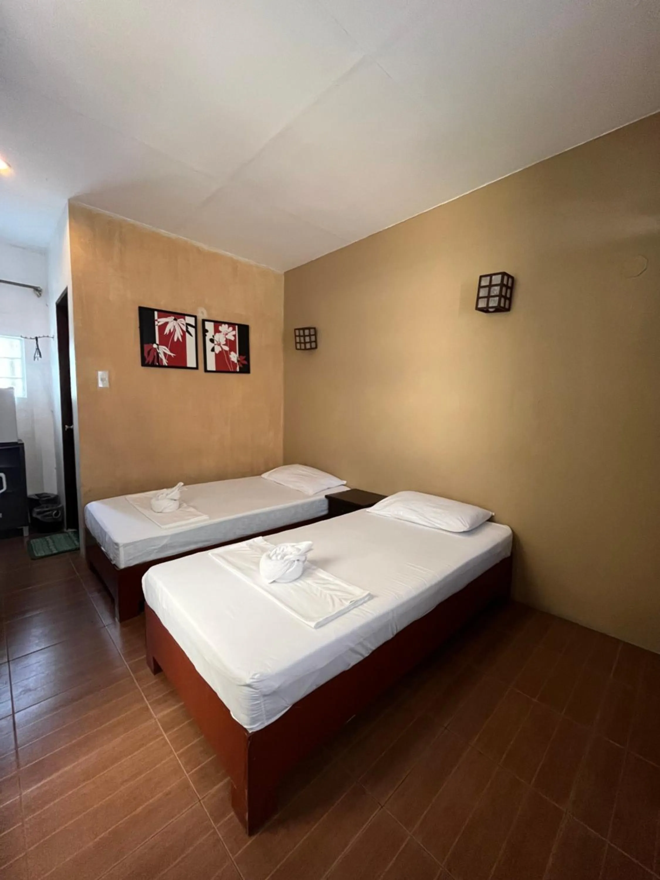 Bed in Boracay Ocean Bay Hotel