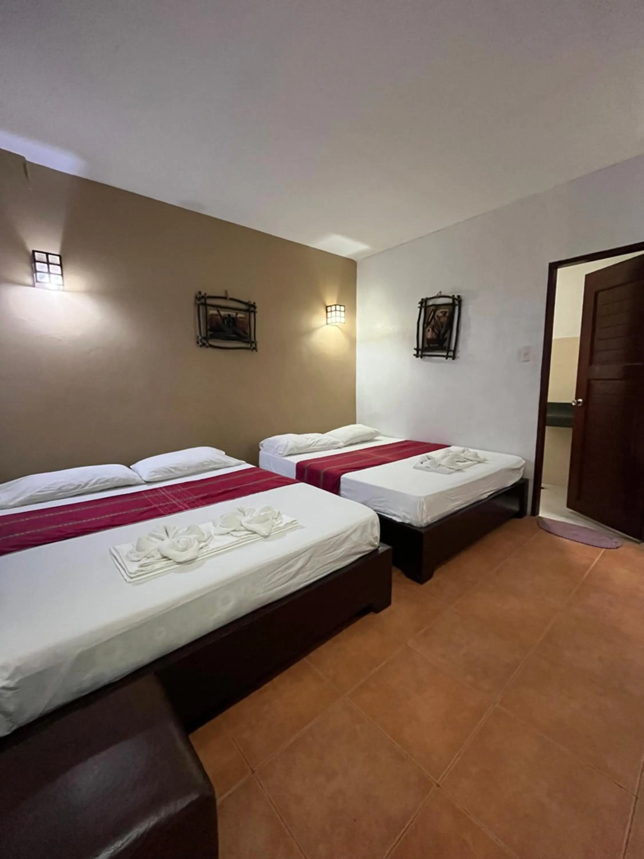 Bed in Boracay Ocean Bay Hotel