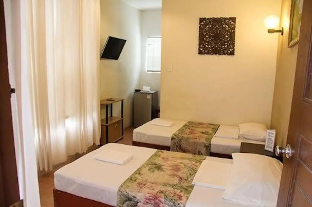 Bed in Boracay Ocean Bay Hotel