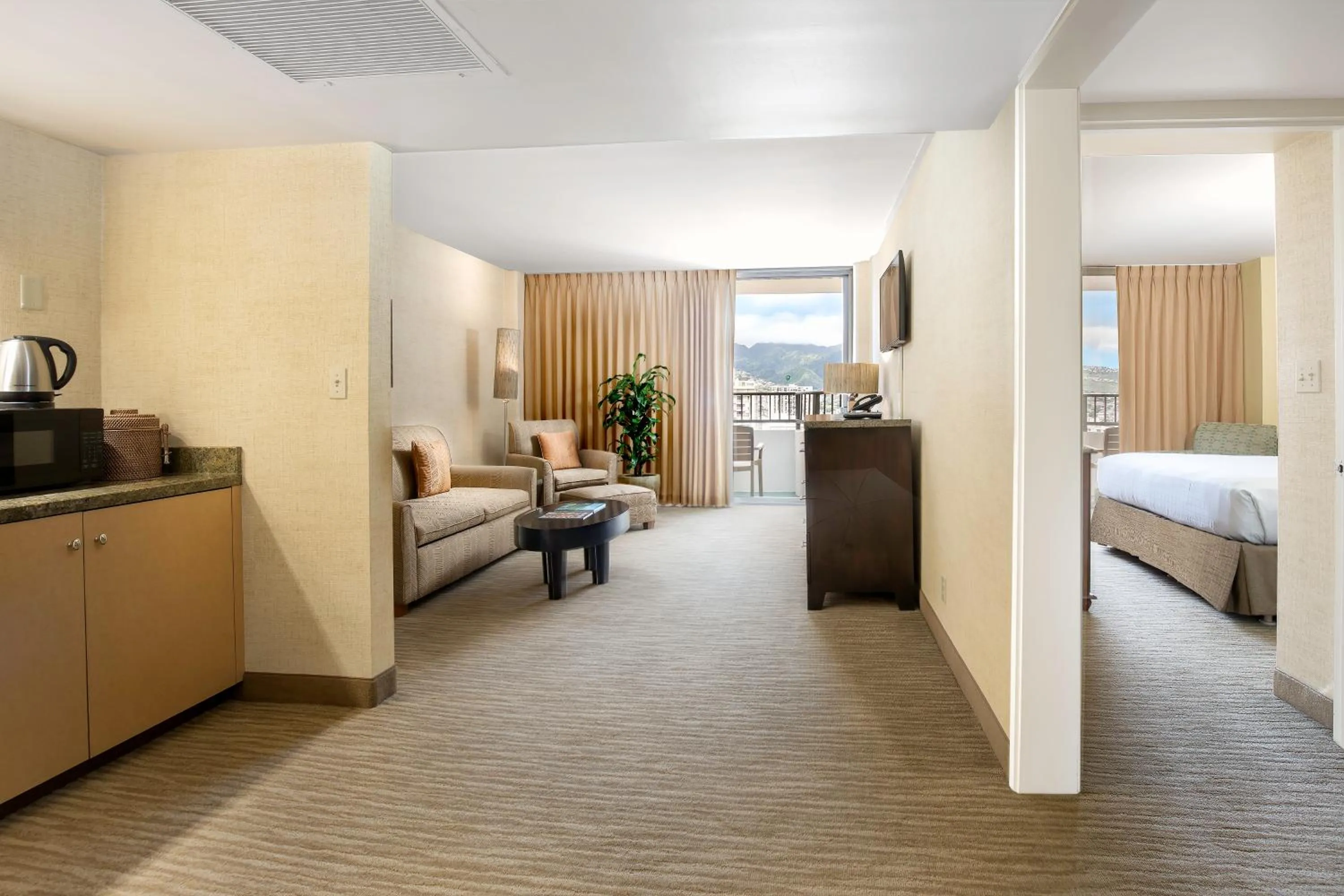 Living room, Bed in Waikiki Resort Hotel