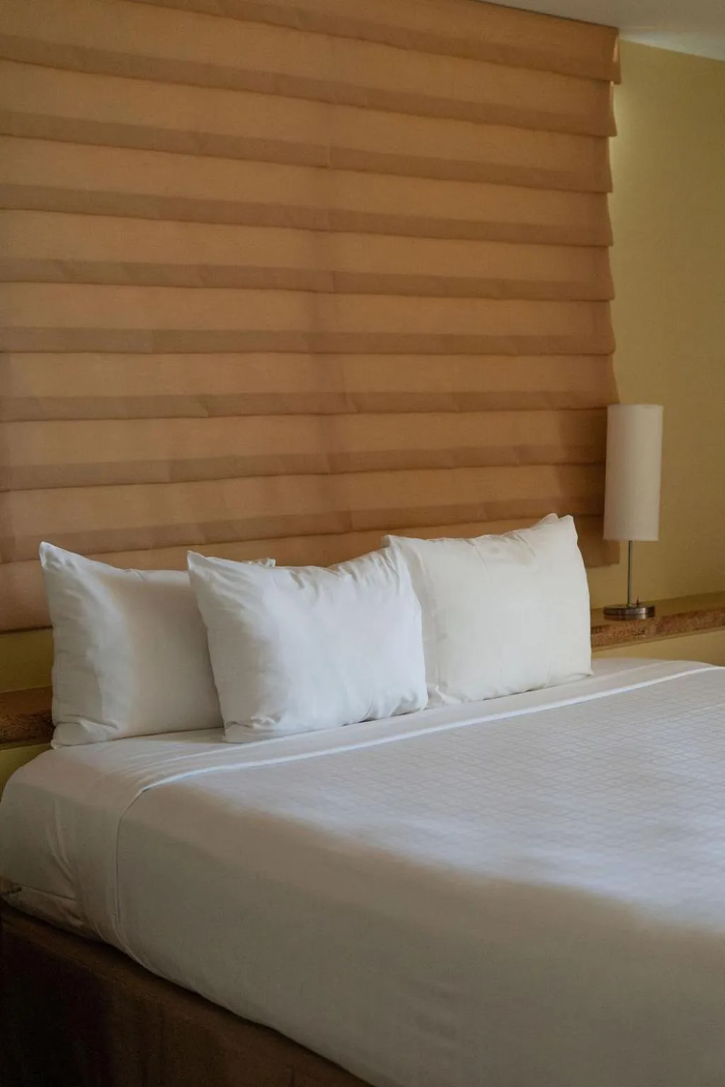 Bed in Waikiki Resort Hotel