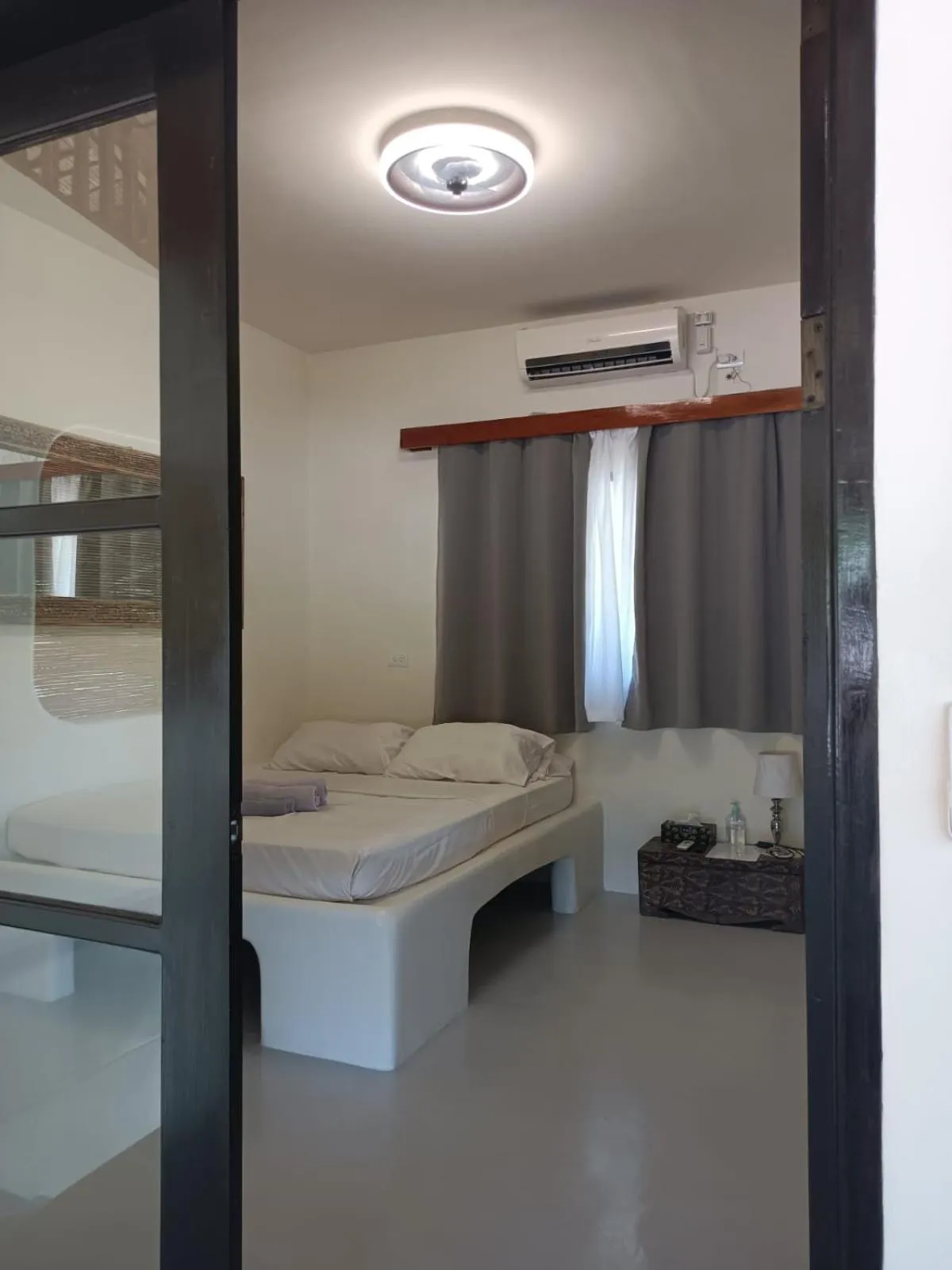 fireplace, Bed in Parrots Boutique Resort