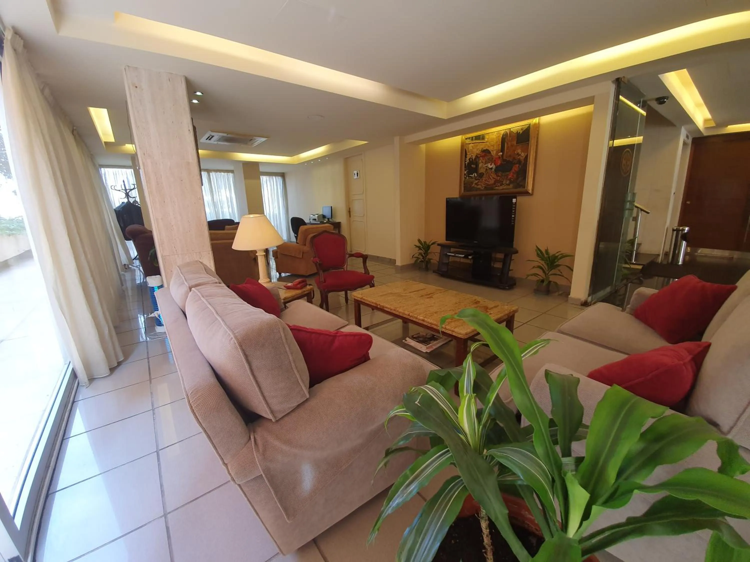 Lobby or reception in Holiday Home Suites