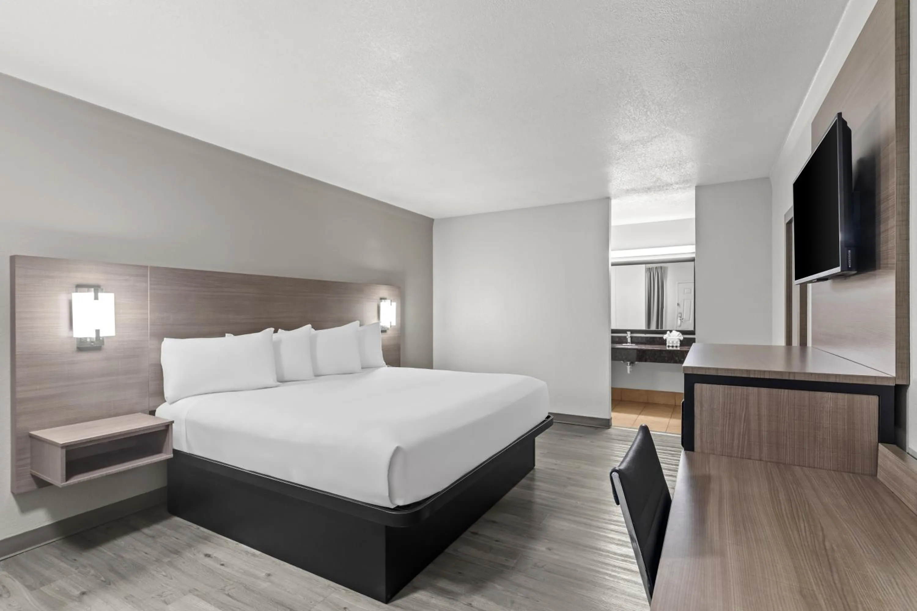 Bedroom, Bed in Americas Best Value Inn Austin