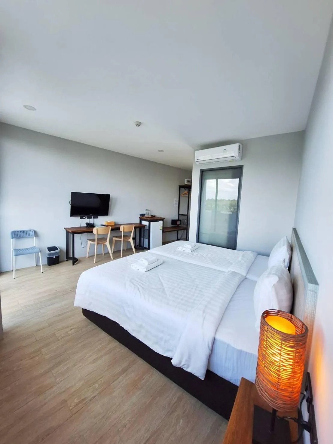 Bed in Atom Phuket Hotel