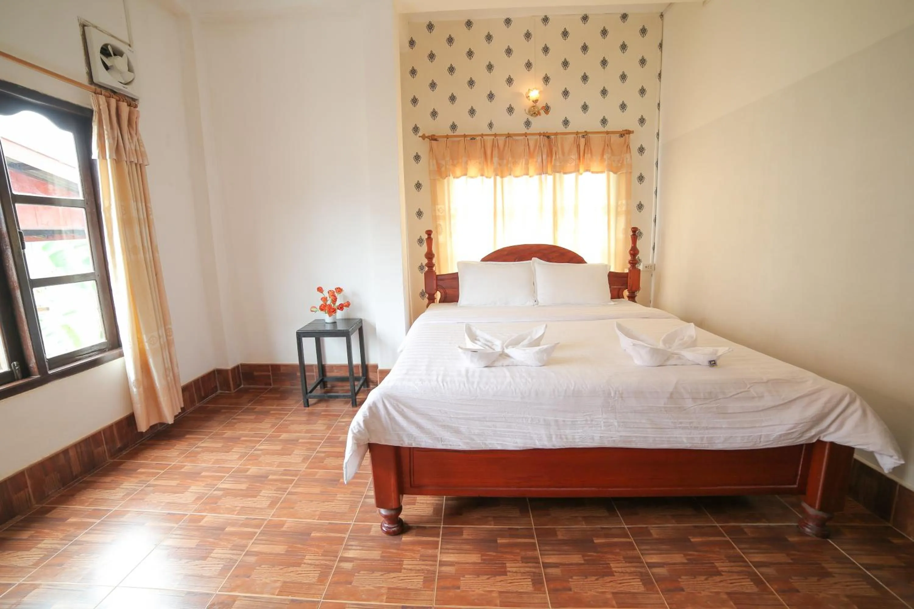 Bed in Maylay Guesthouse