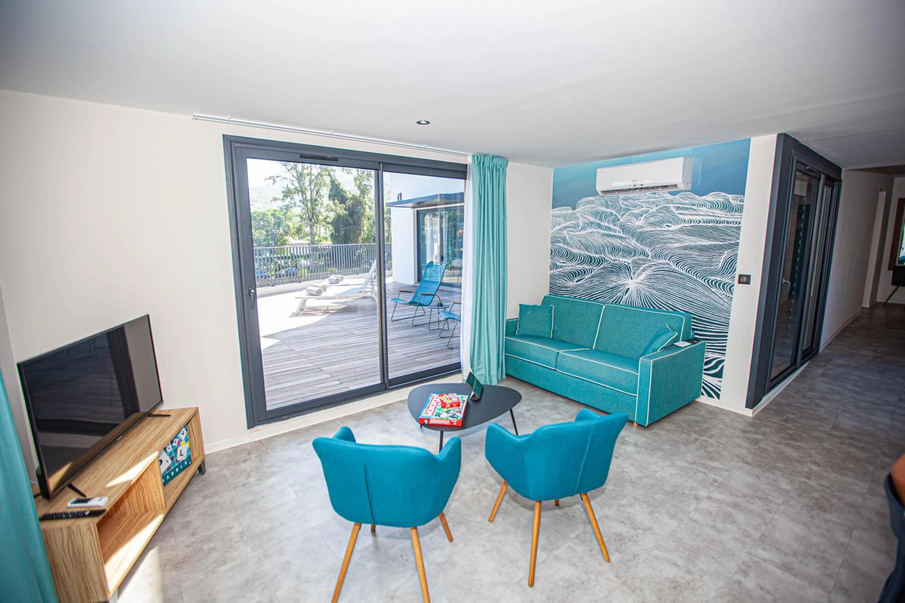 Communal lounge/ TV room in Résidence Santa Apolonia