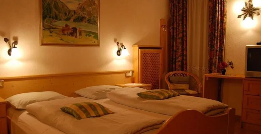 Photo of the whole room, Bed in Albergo Genziana