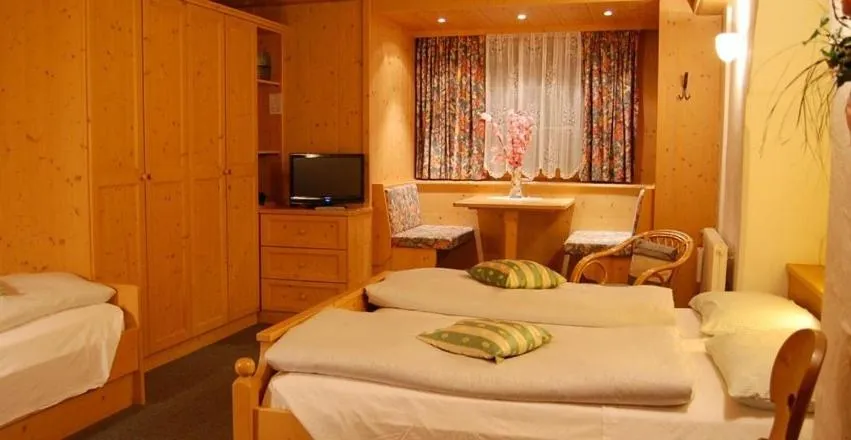 Photo of the whole room, Bed in Albergo Genziana