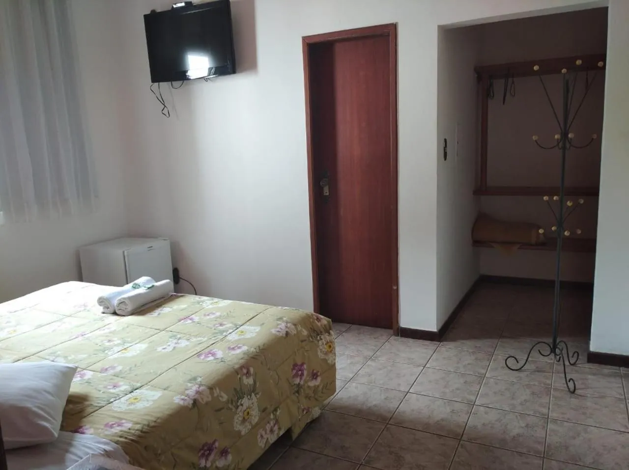 Bed in Pousada Aconchego de Minas