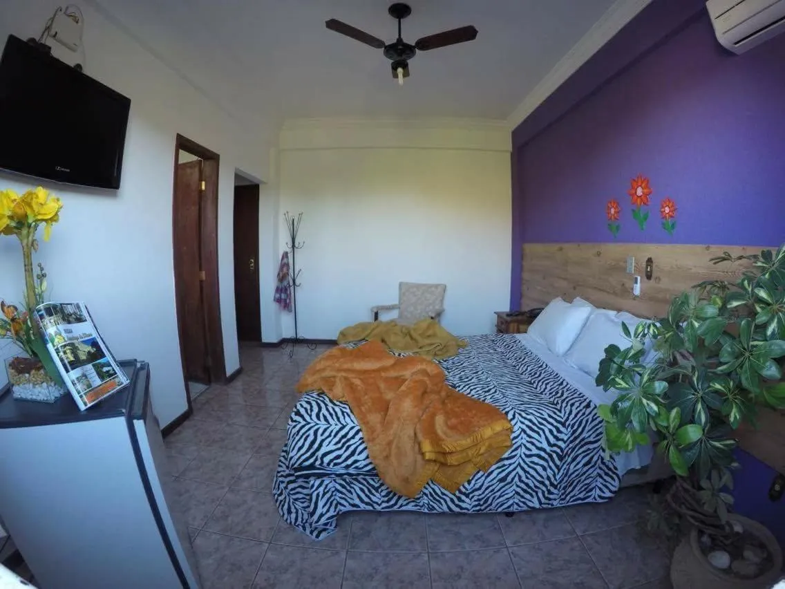 Bed in Pousada Aconchego de Minas