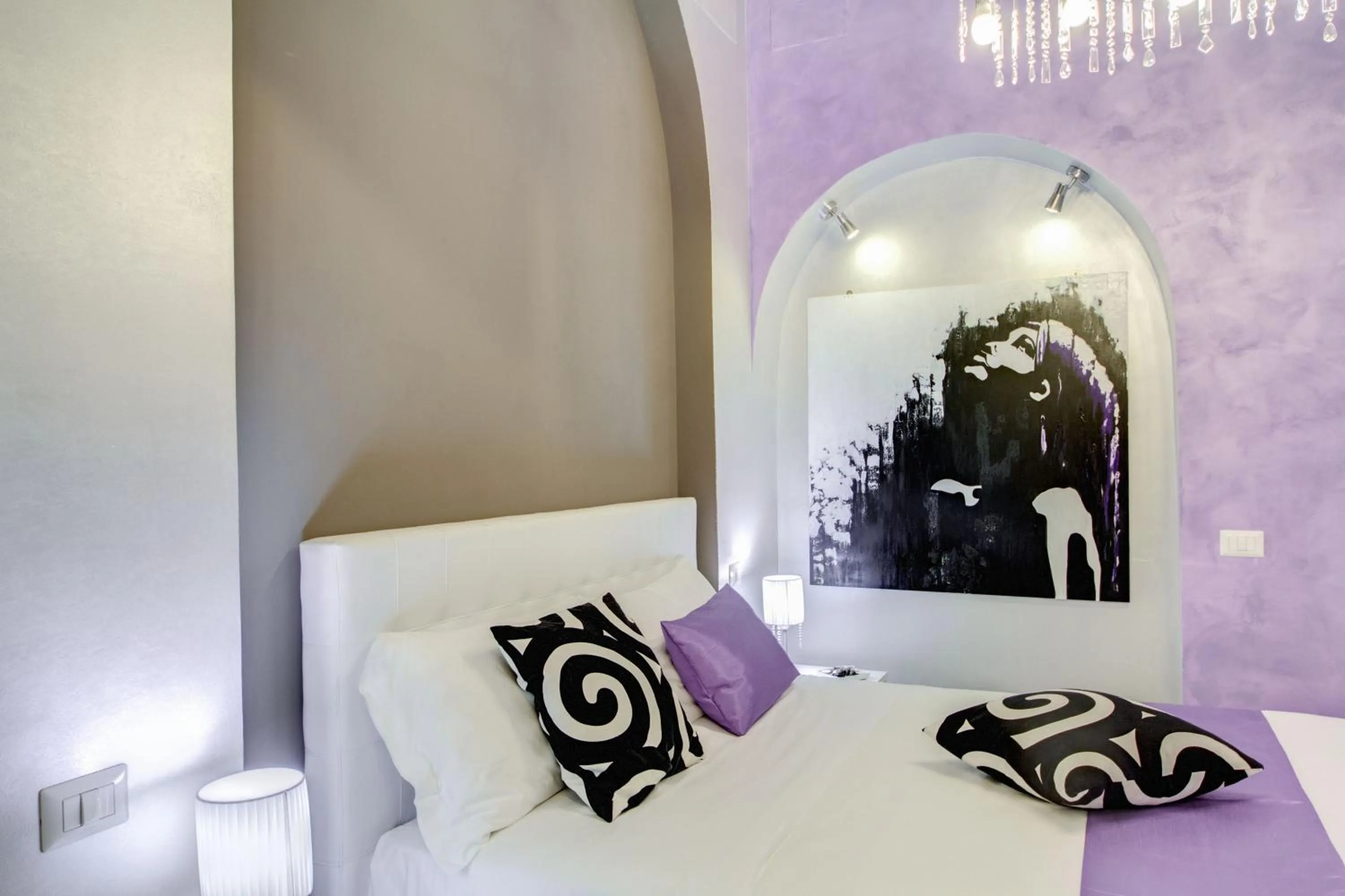 Bed in B&B Colosseo Panoramic Rooms