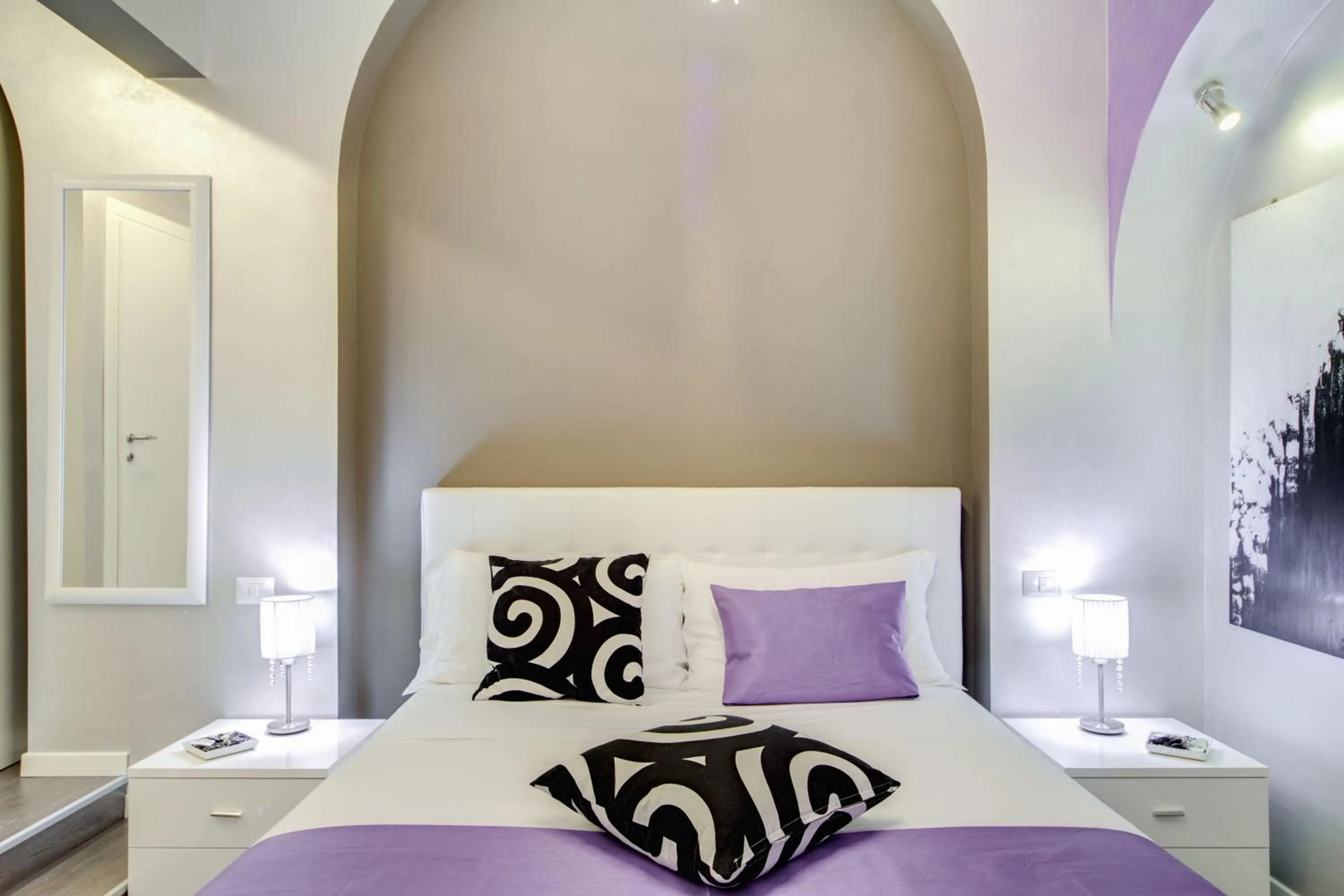 Bed in B&B Colosseo Panoramic Rooms