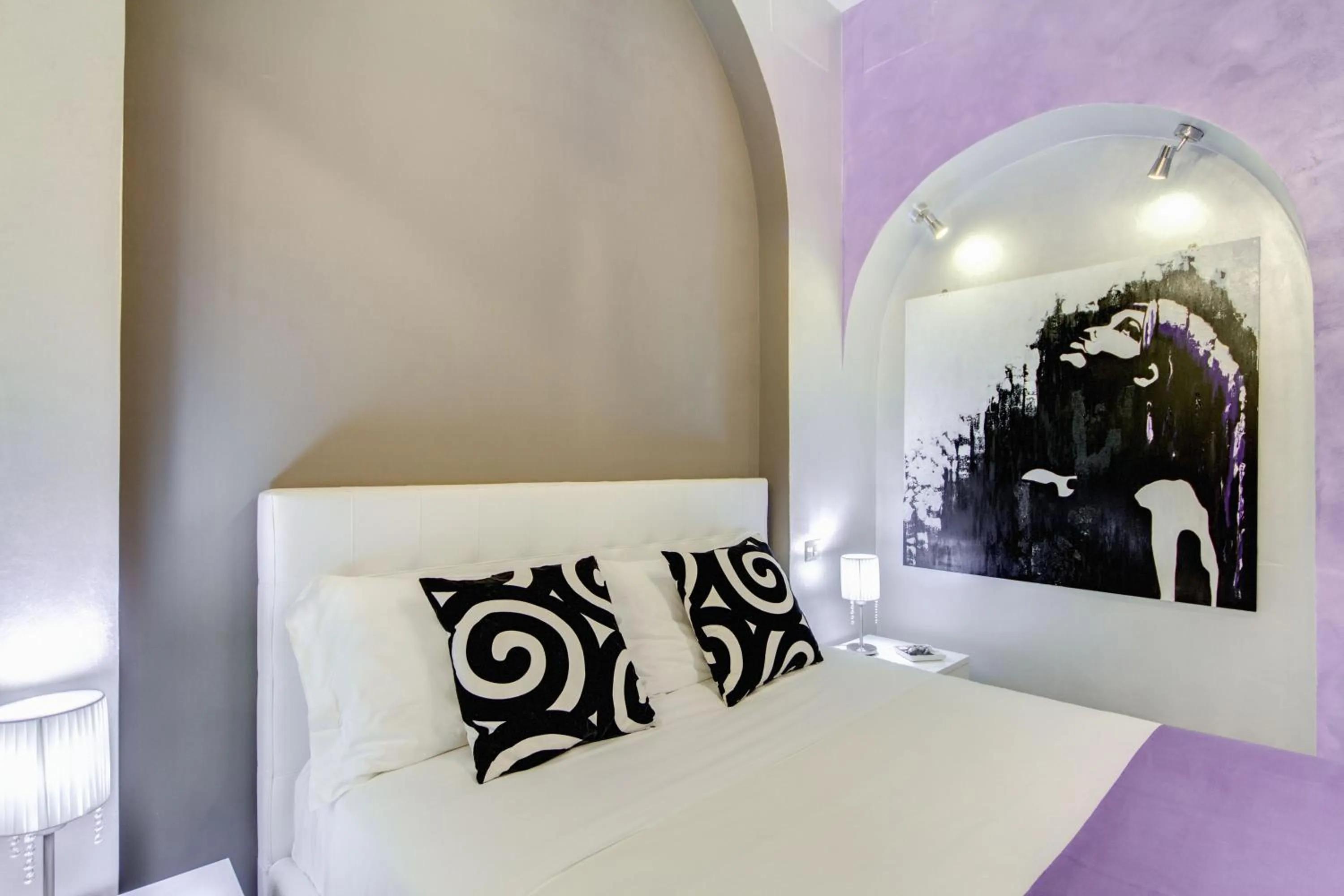 Bed in B&B Colosseo Panoramic Rooms