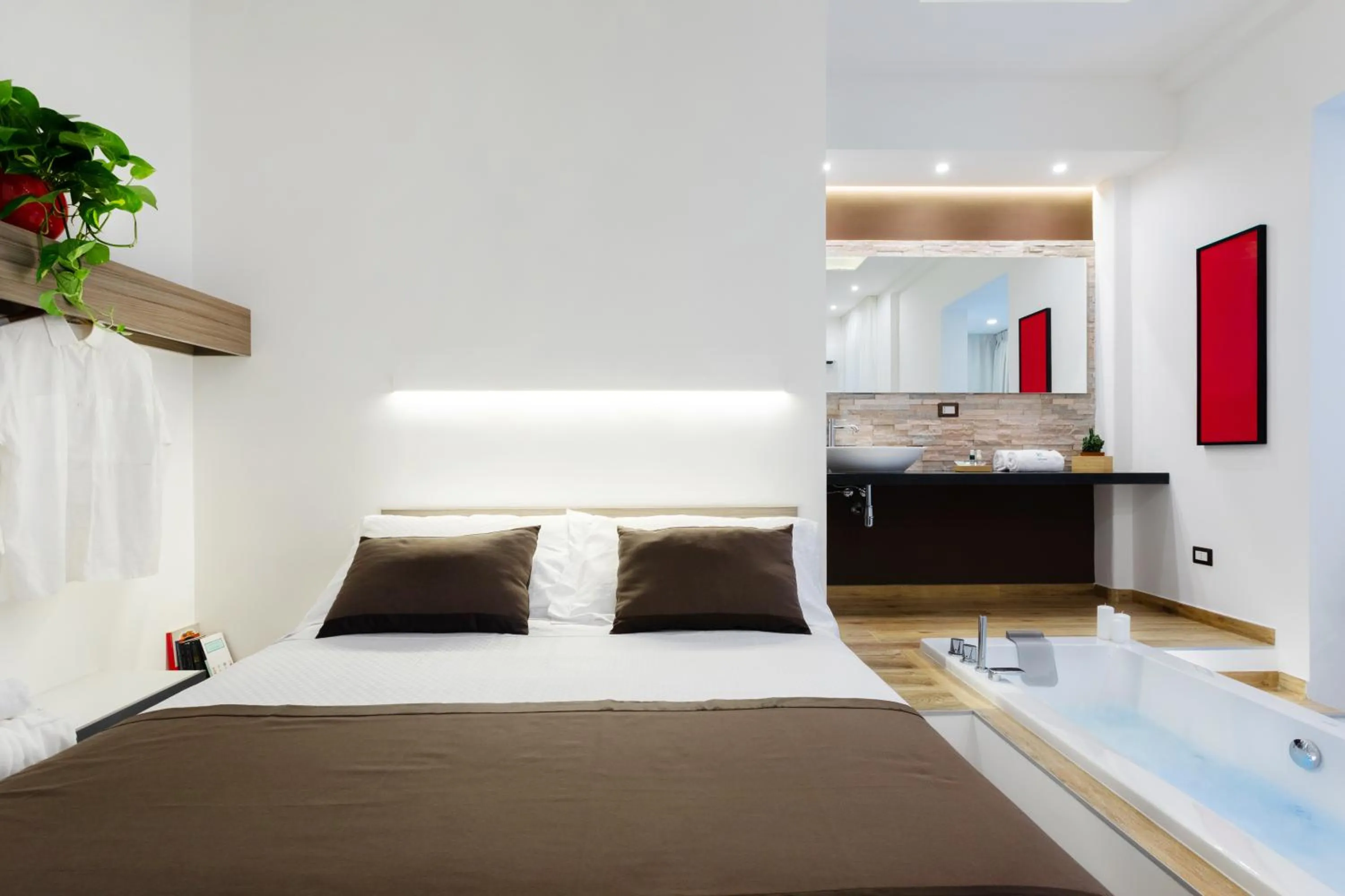 Hot Tub, Bed in Lighea aqua suites and breakfast